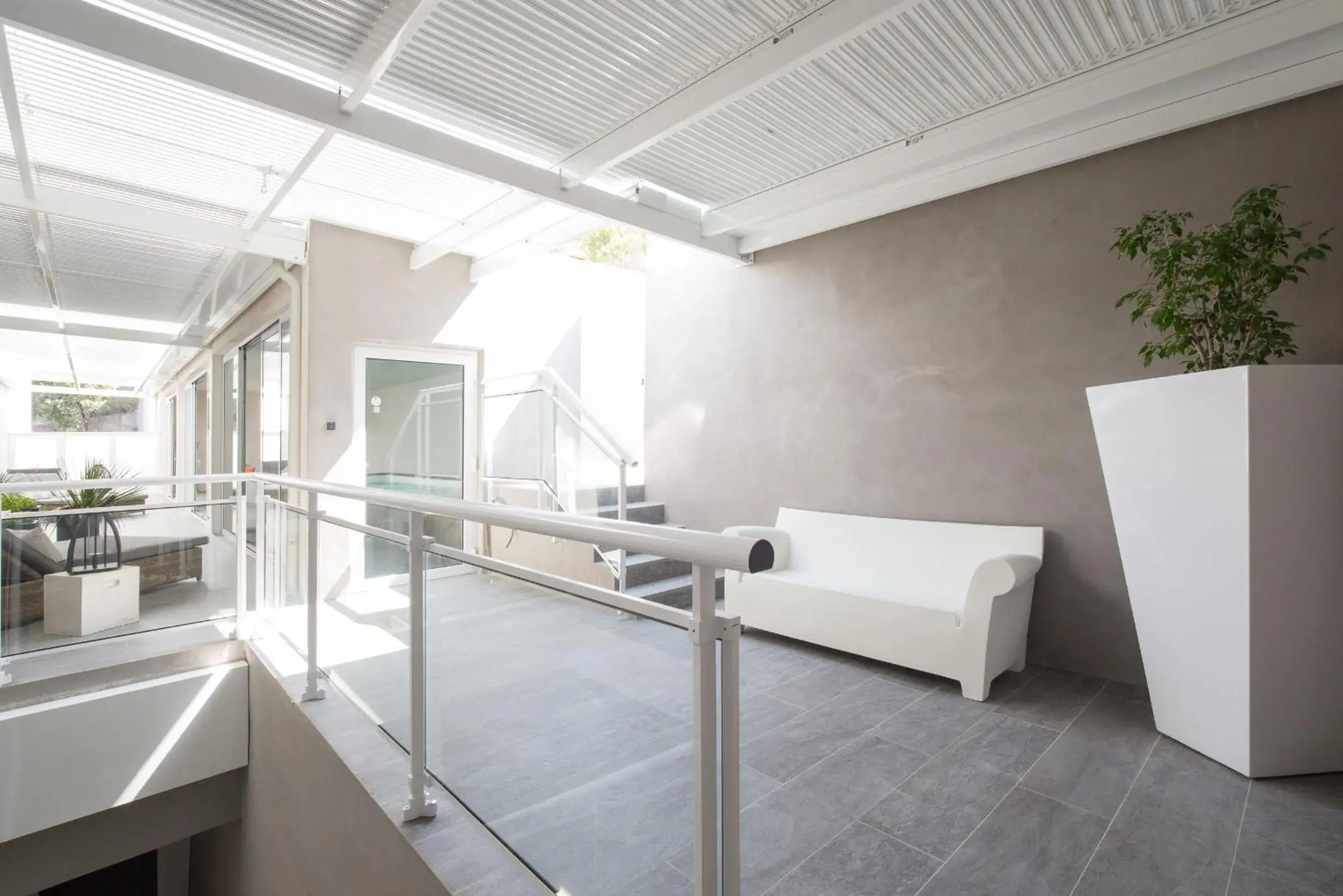 Swimming pool, Seating Area in Hotel Revellata