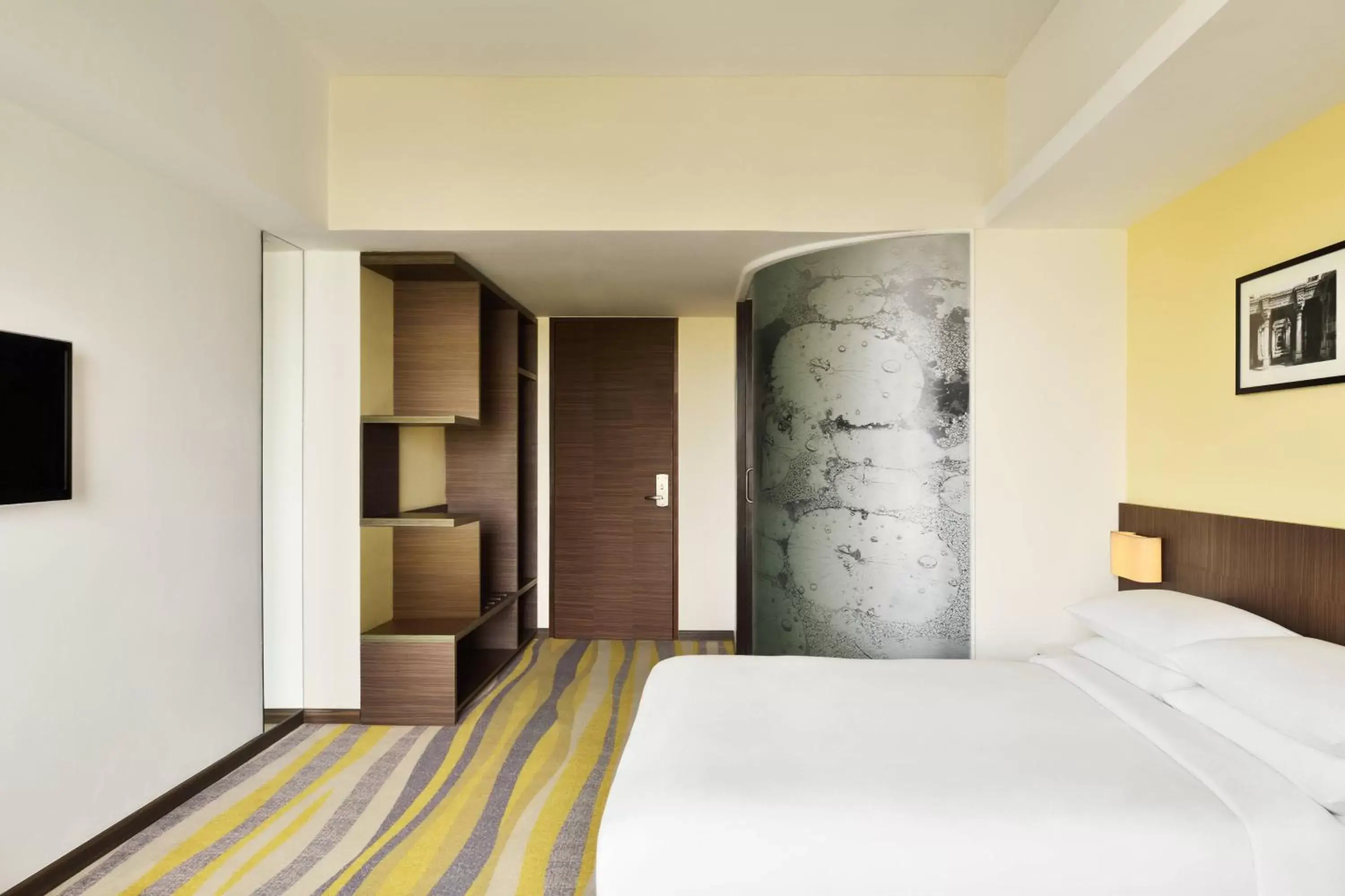 Photo of the whole room, Bed in Fairfield by Marriott Ahmedabad