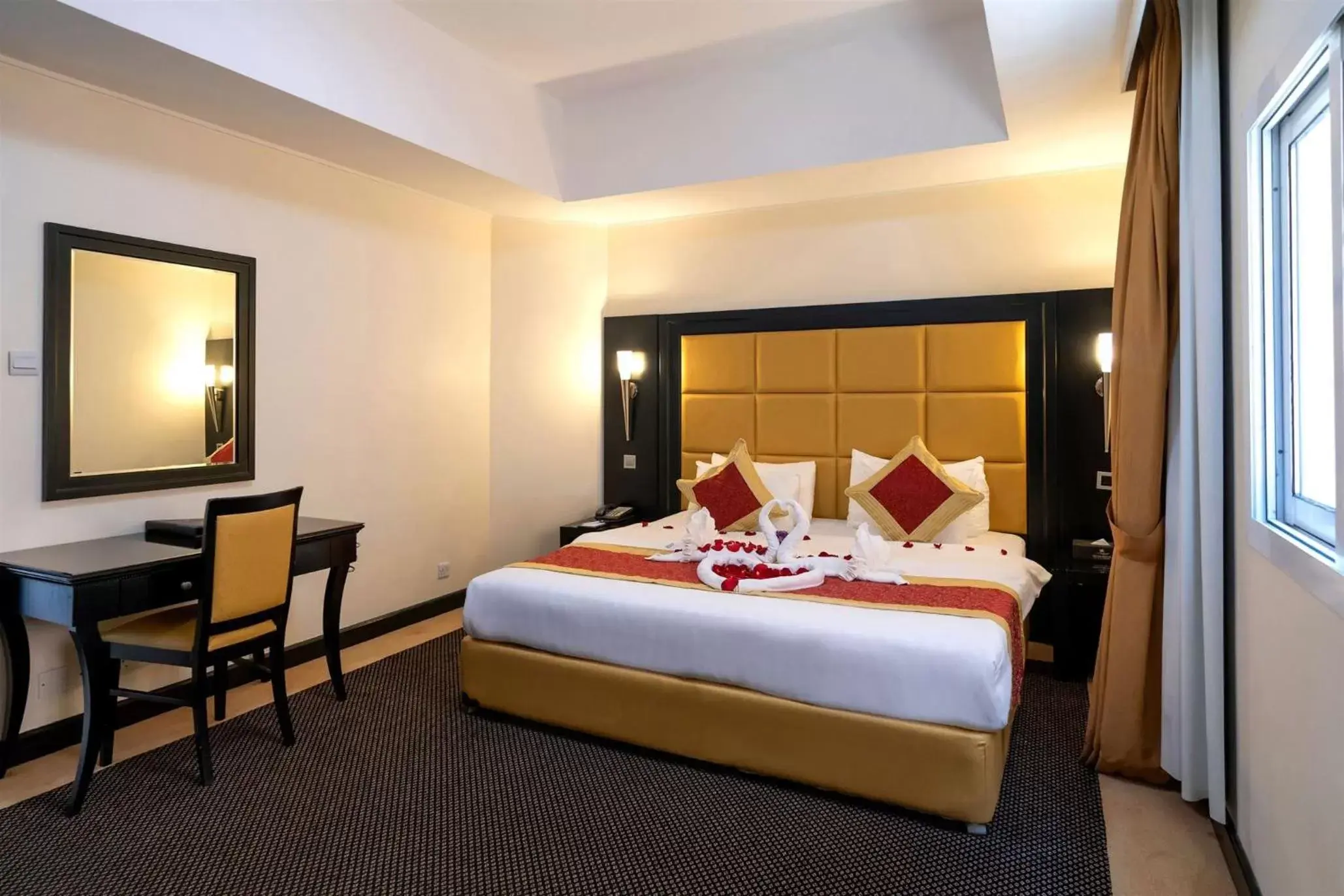 Bed in Royal Beach Hotel & Resort