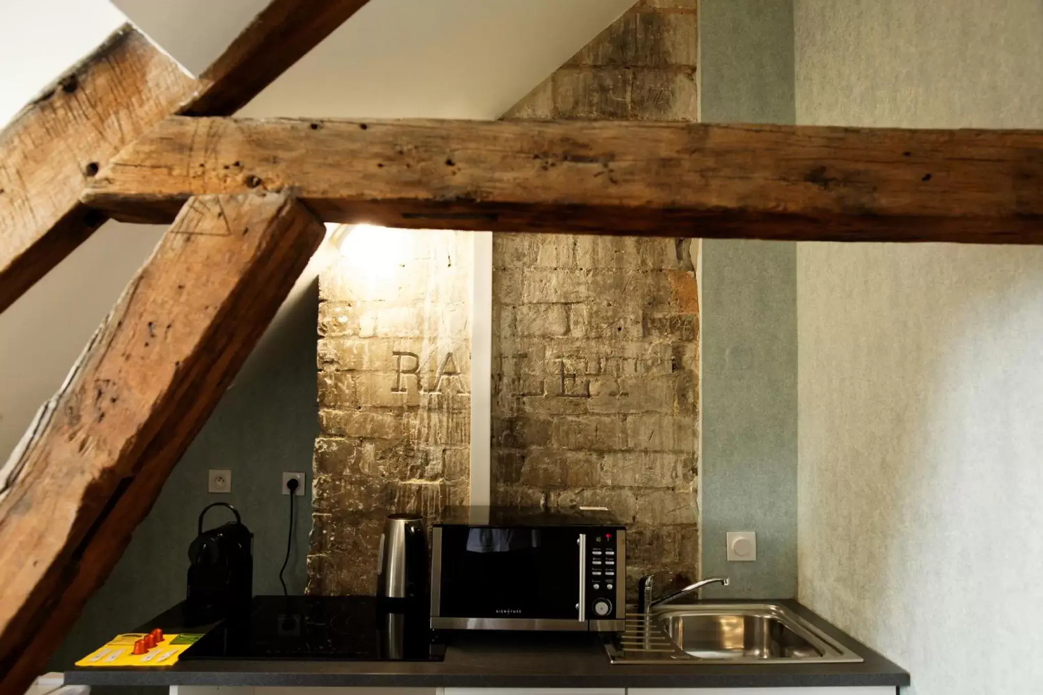 Kitchen/Kitchenette in Appart'Hôtel Sainte Trinité