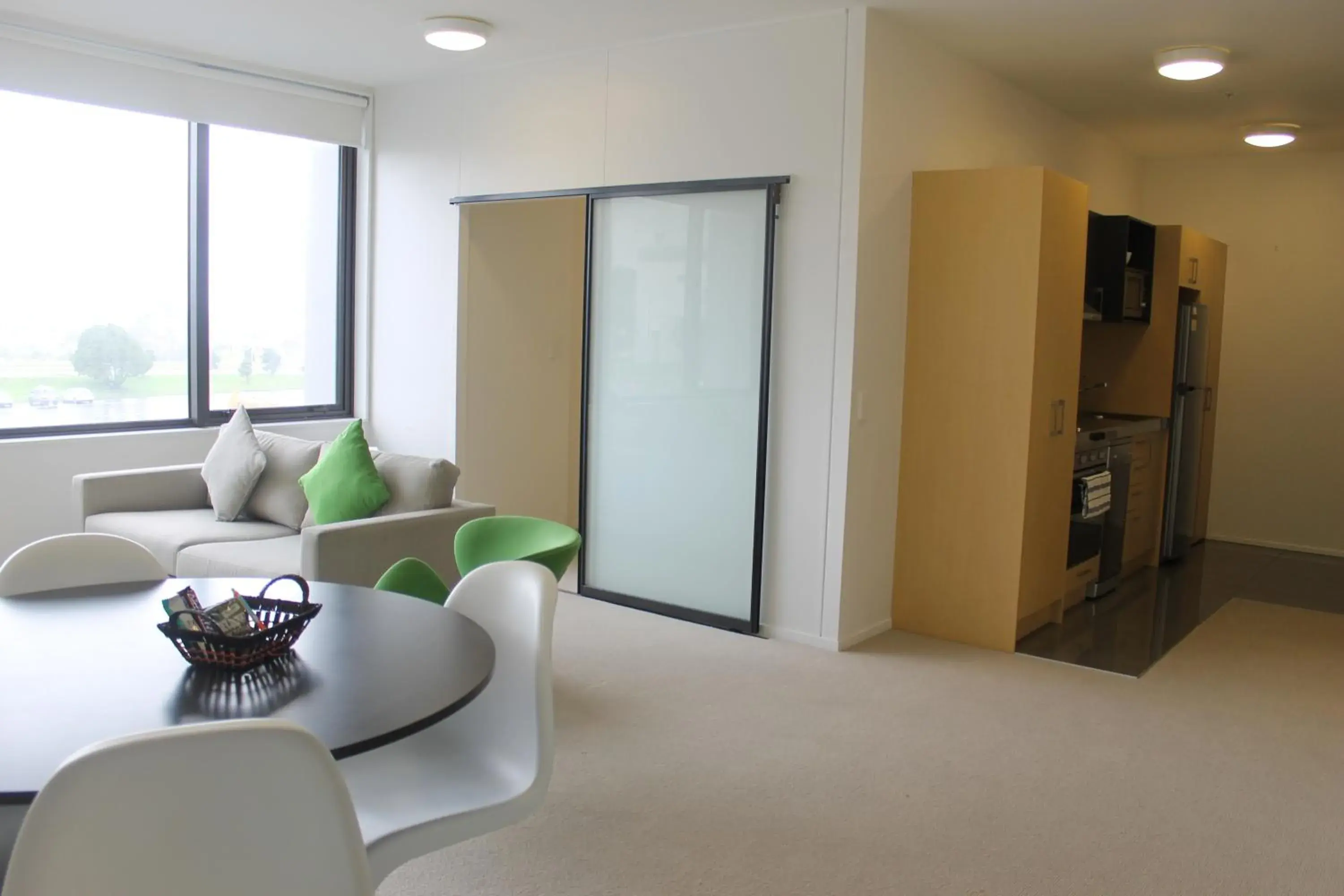 Kitchen or kitchenette, Seating Area in MCentral Apartments Manukau