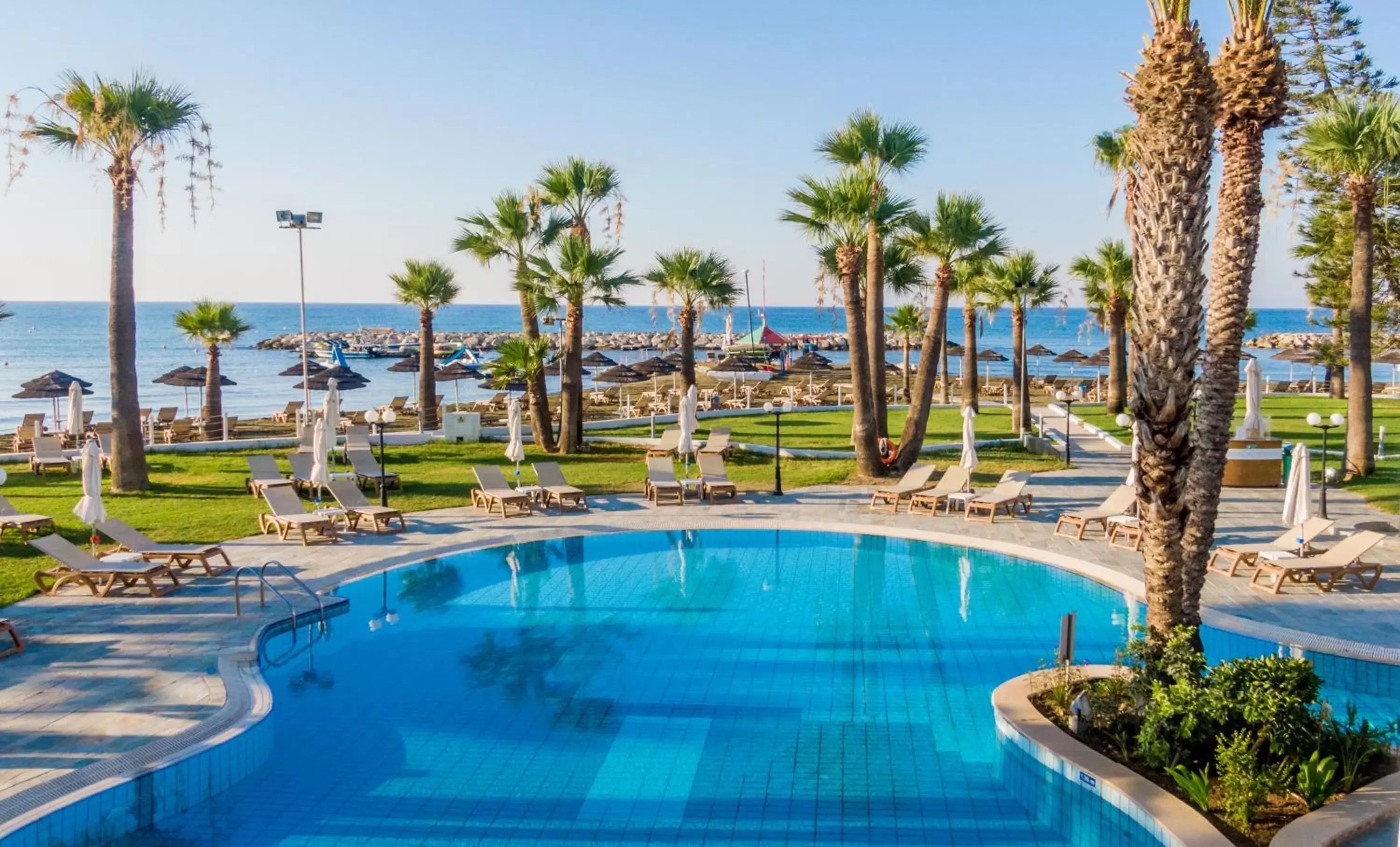 Beach, Swimming Pool in Golden Bay Beach Hotel