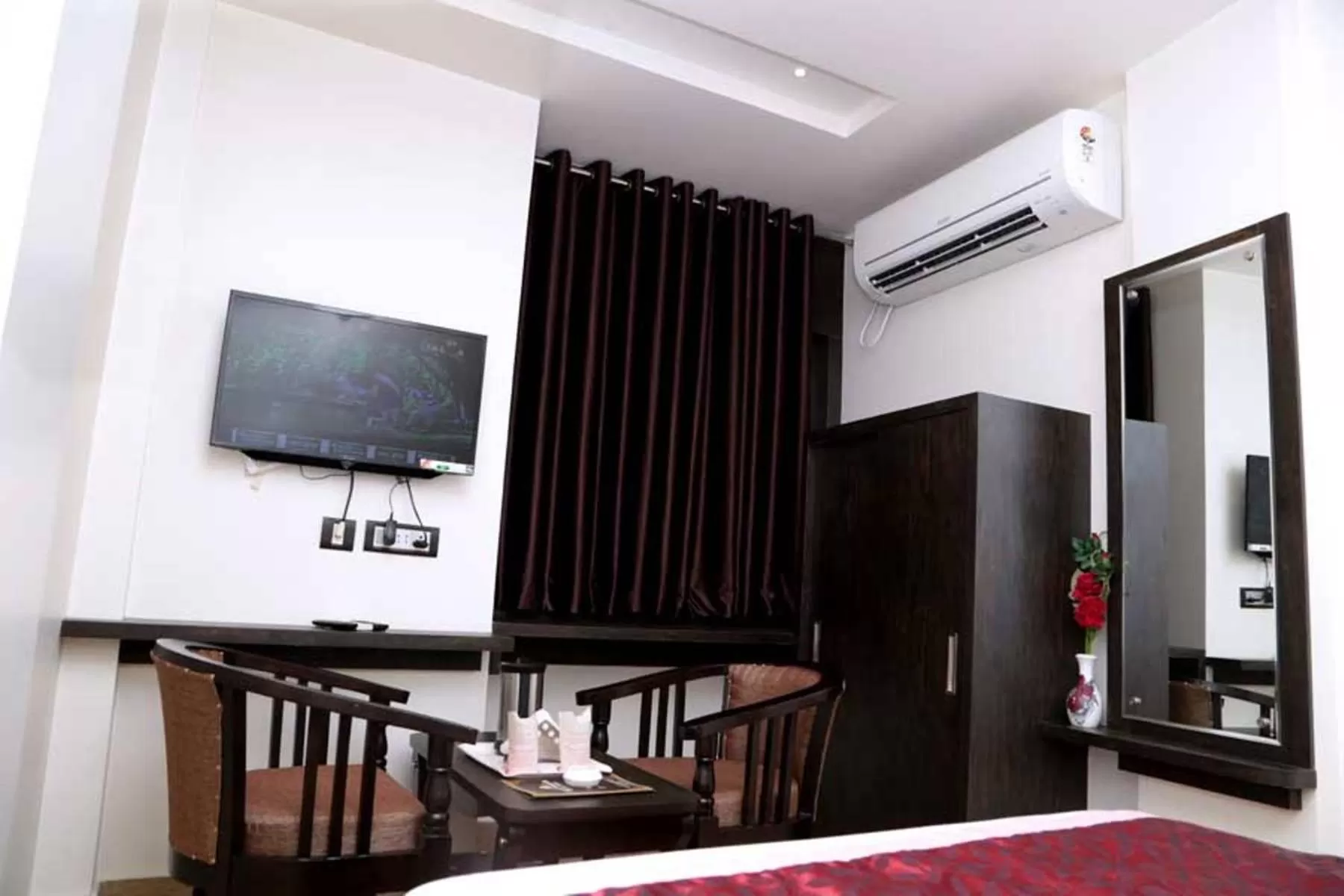 Bed in Hotel Vinayak Lifestyle Hotels