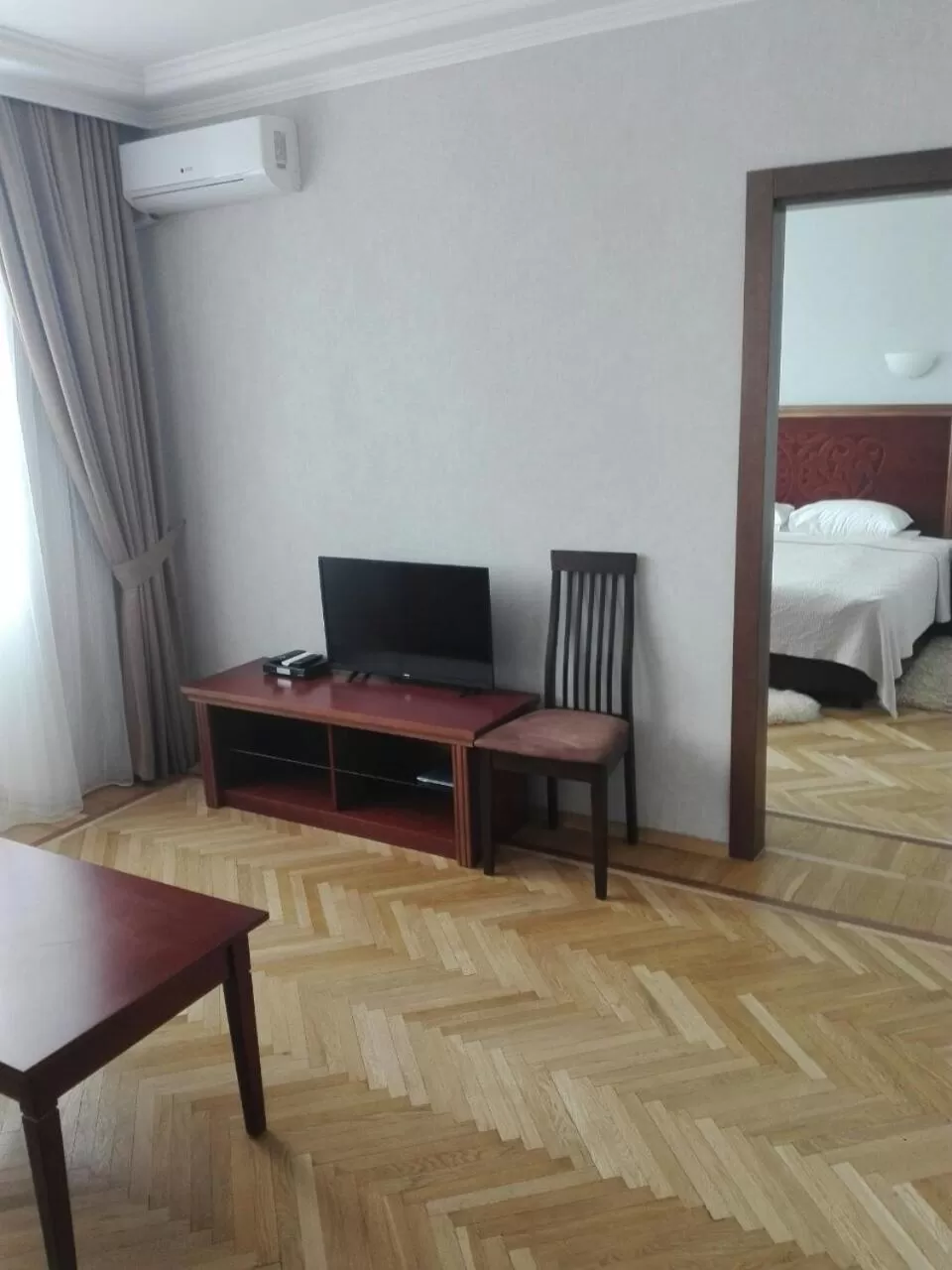 Living room, Bed in Dnipro Hotel
