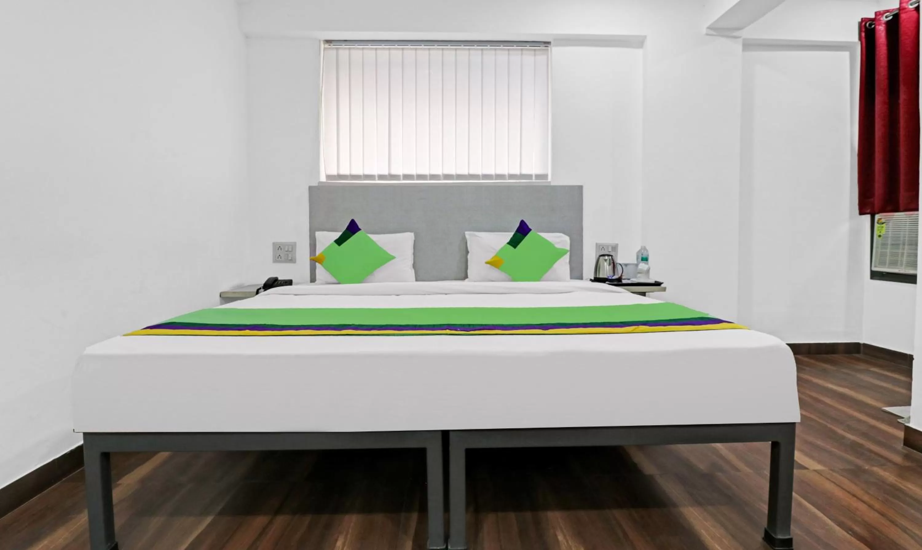 Bedroom, Bed in Treebo Grand Town House