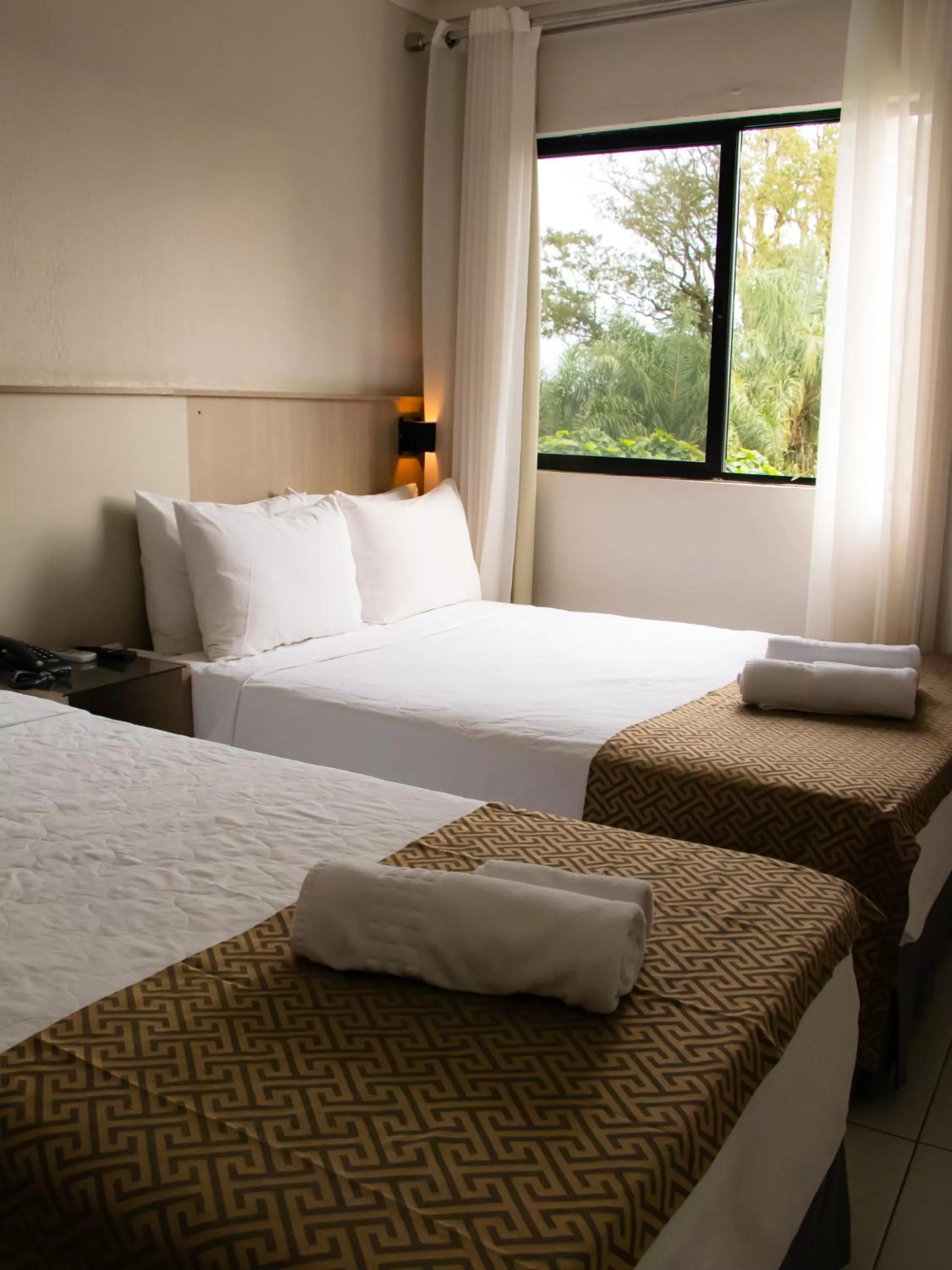 Bed in Iguassu Express Hotel