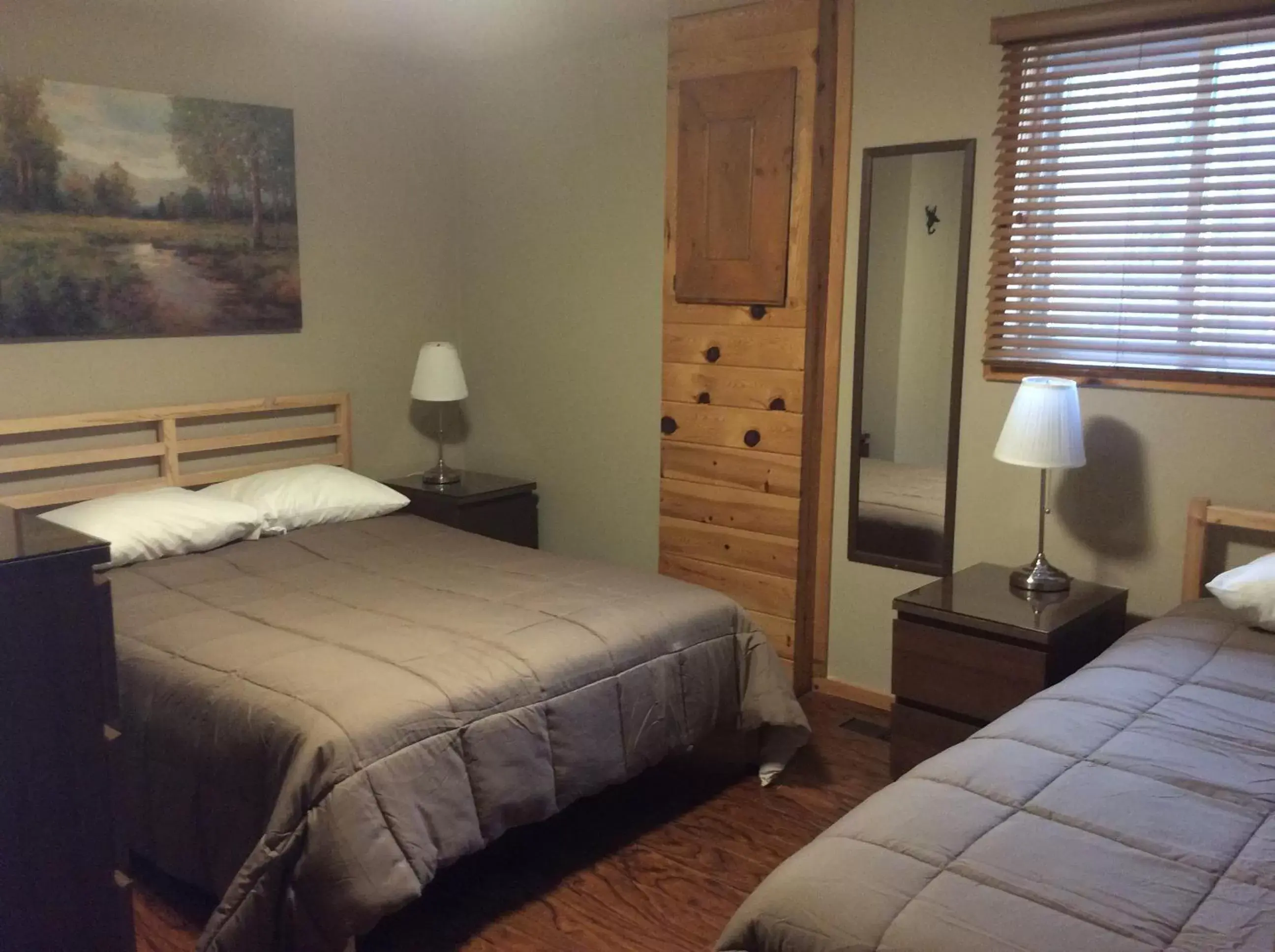 Bed in Madawaska Lodge