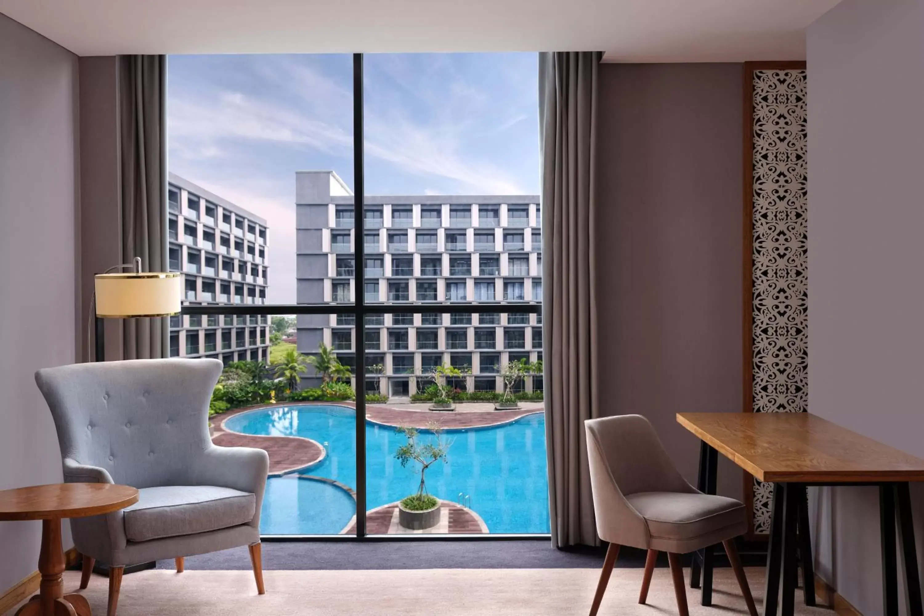 Photo of the whole room, Pool View in Four Points by Sheraton Balikpapan
