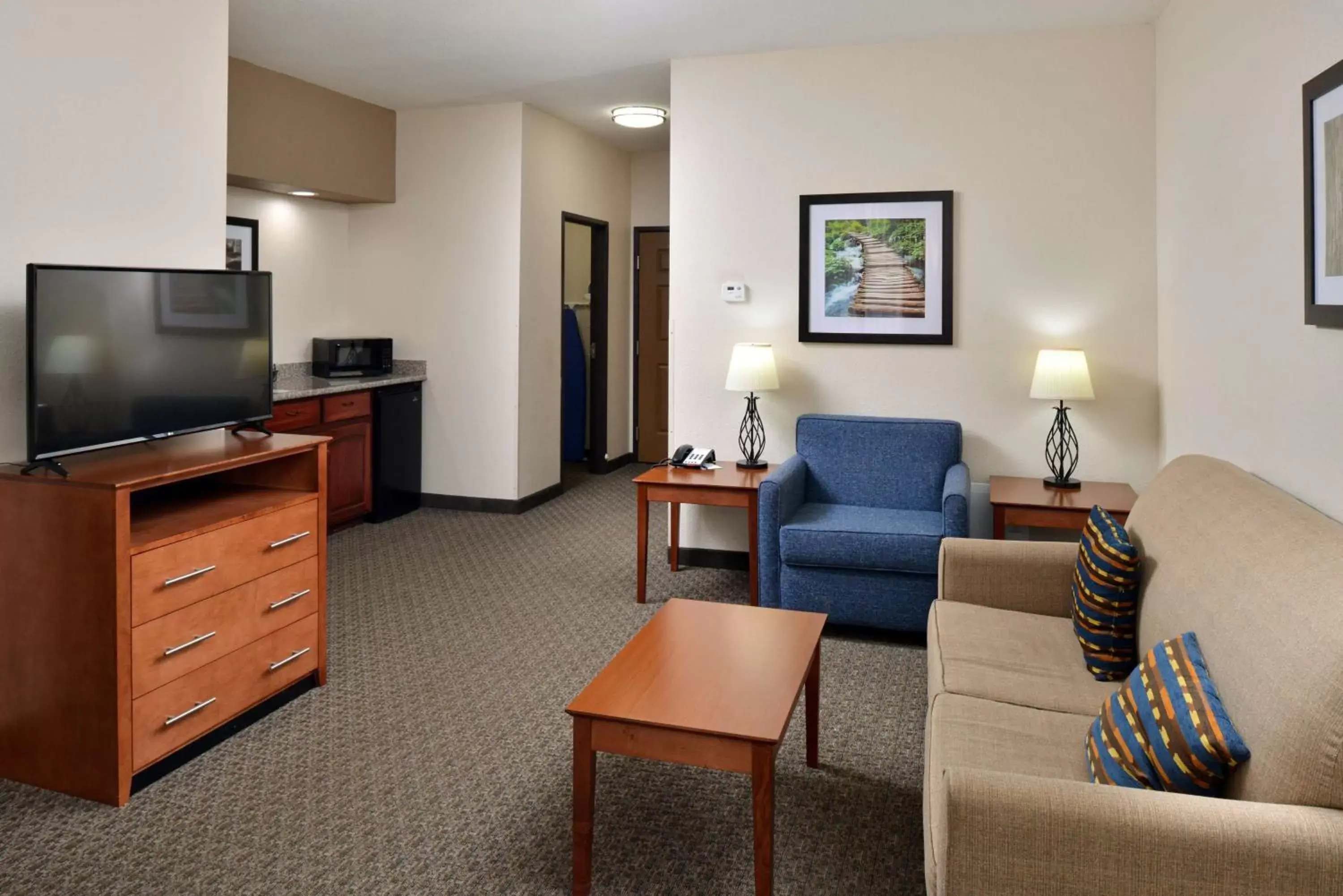 Bedroom, Seating Area in Best Western Big Spring Lodge