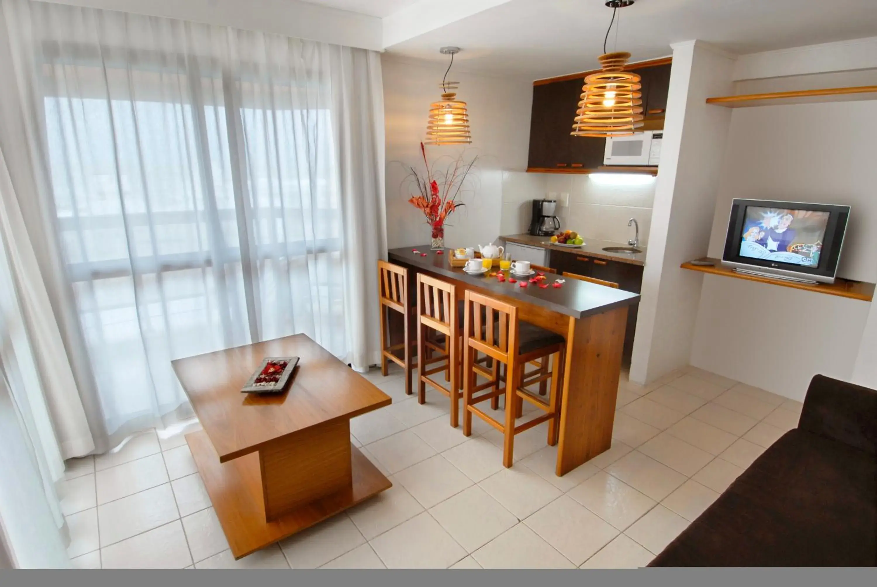 Kitchen or kitchenette, Dining Area in Golden Beach Resort & Spa