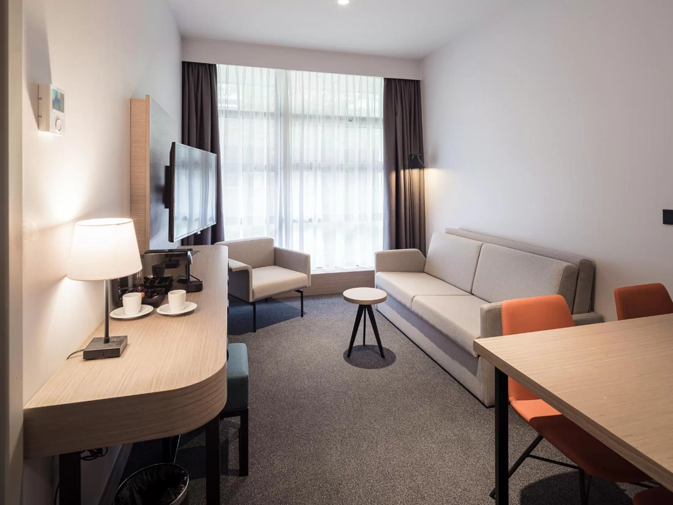 Living room, Bed in Executive Residency by Best Western Amsterdam Airport