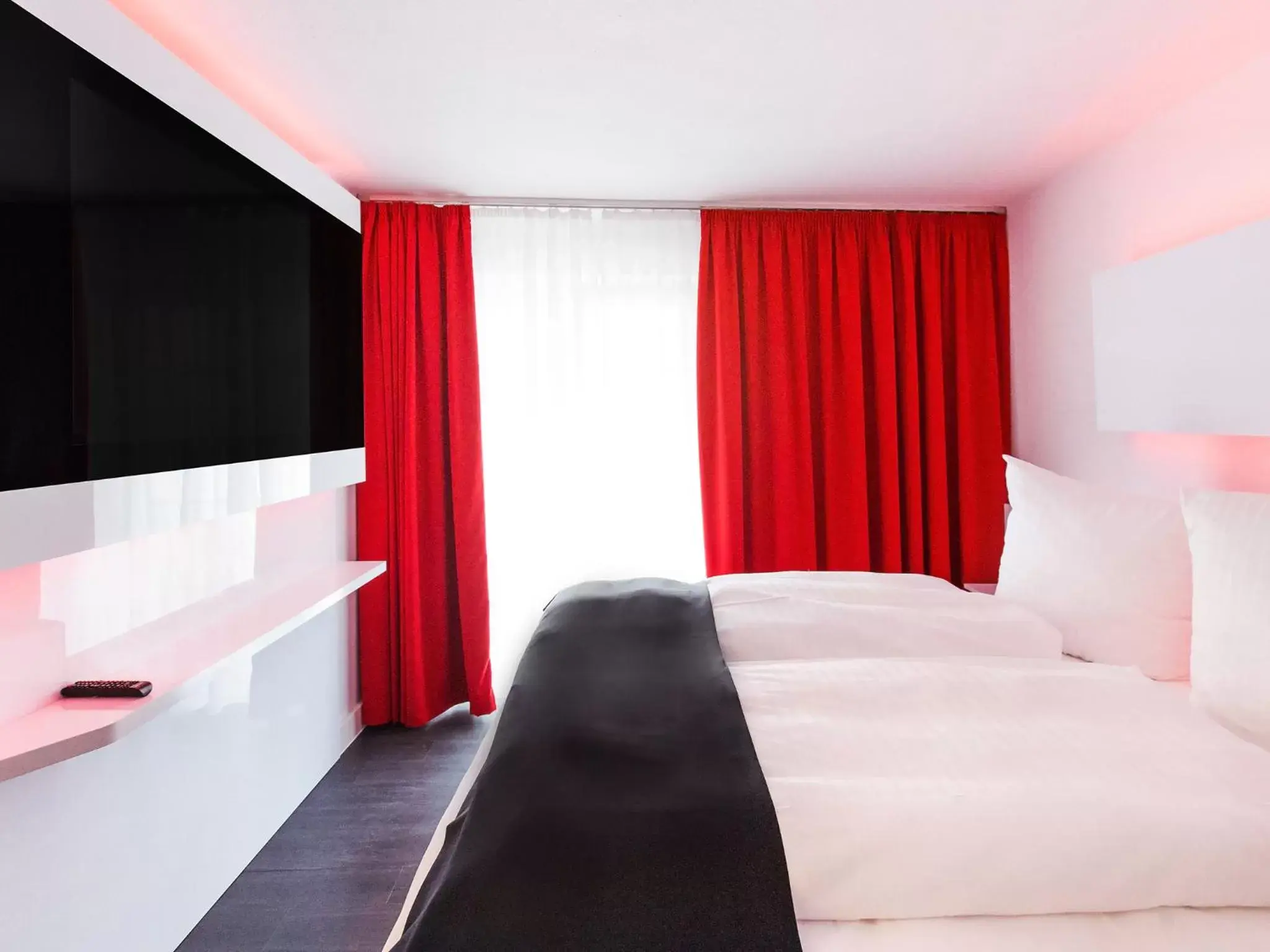 Photo of the whole room, Bed in DORMERO Hotel Villingen-Schwenningen