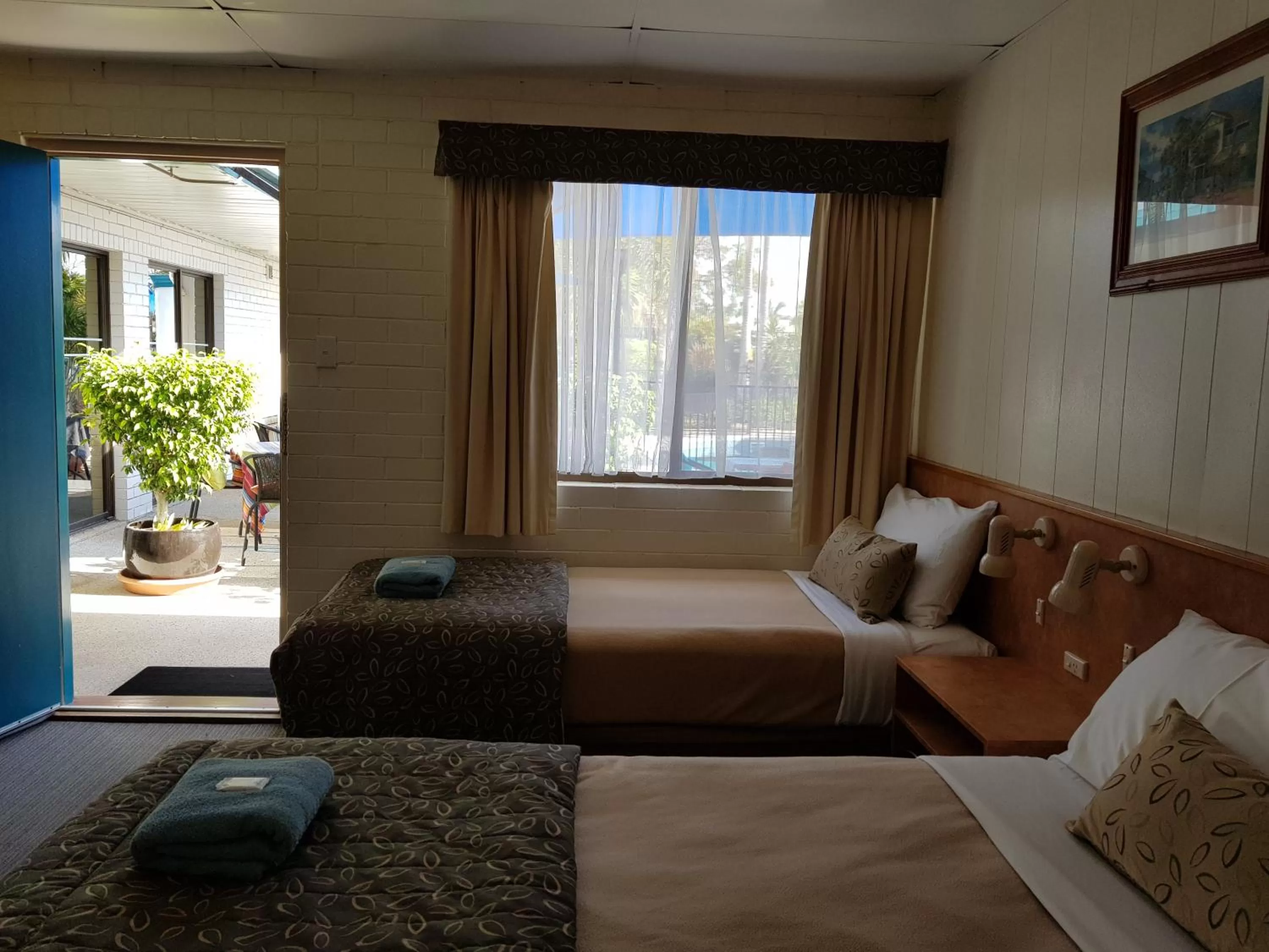 Bed in Peppercorn Motel