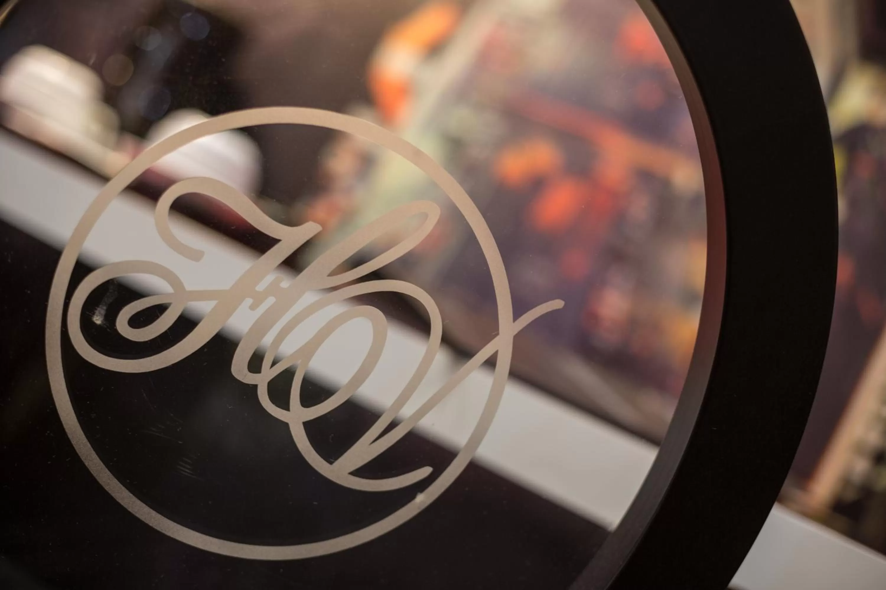 Property logo or sign in Hôtel Les Voyageurs