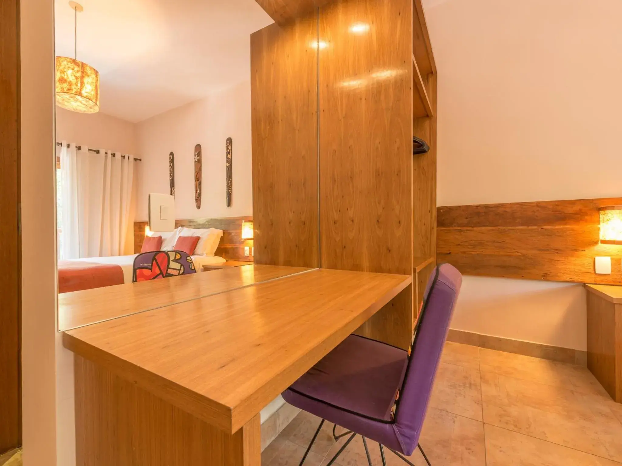 Bedroom, Dining Area in Kalango Hotel Boutique