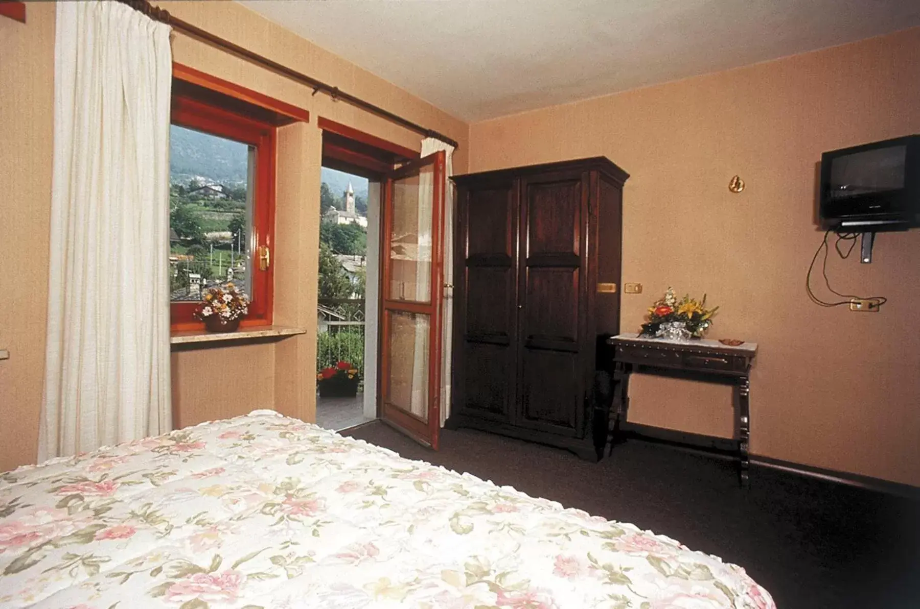 Family Room (2 Adults + 2 Children) with Balcony in Hotel Casale