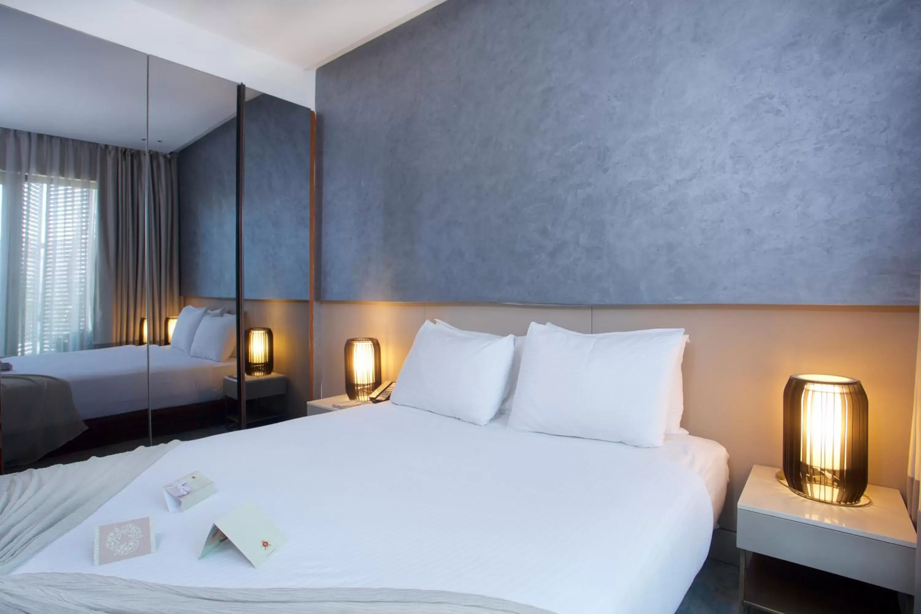 Bed in Dosso Dossi Hotels & Spa Downtown