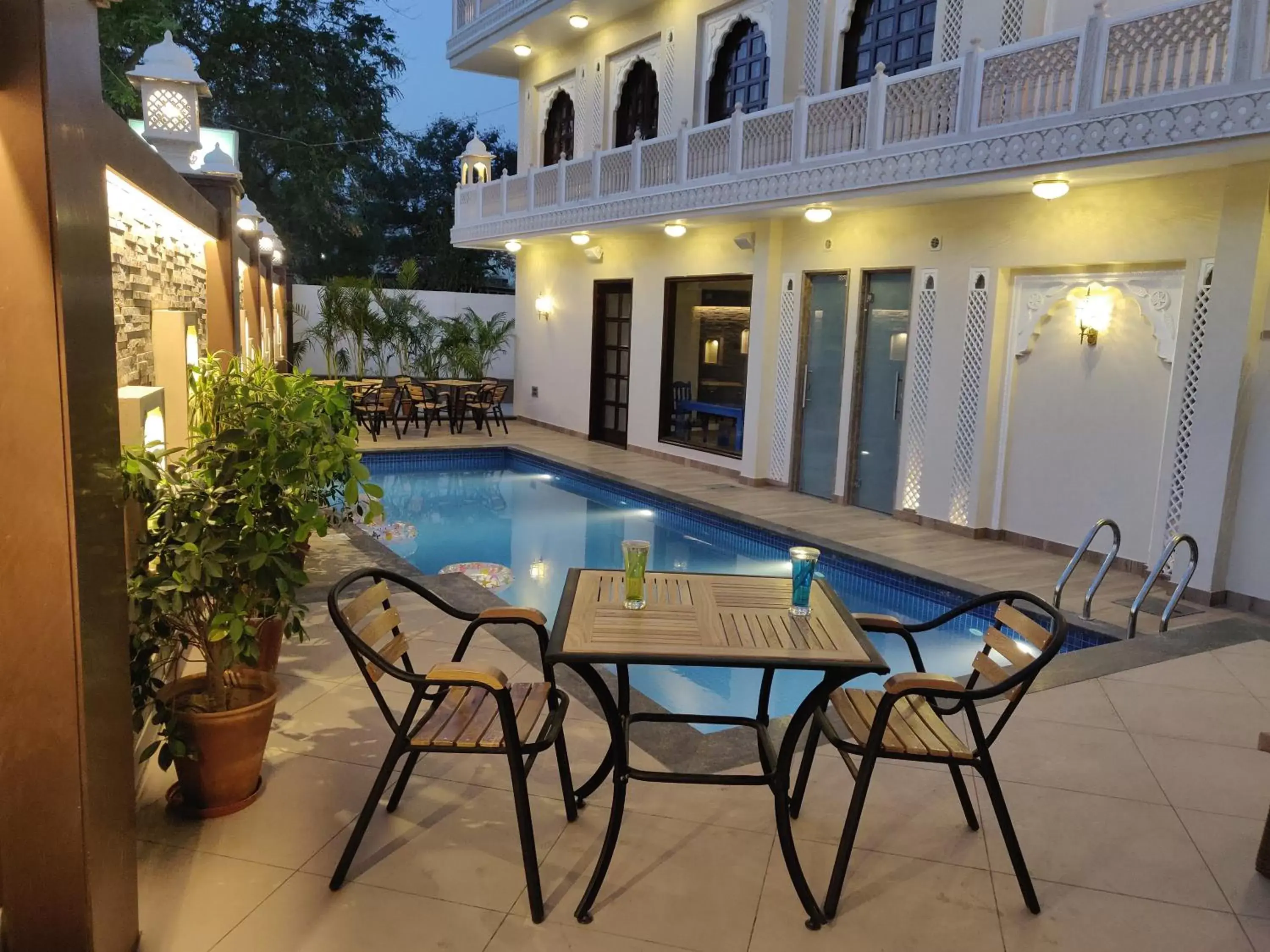 Lounge or bar, Swimming Pool in Laxmi Palace Heritage Boutique Hotel
