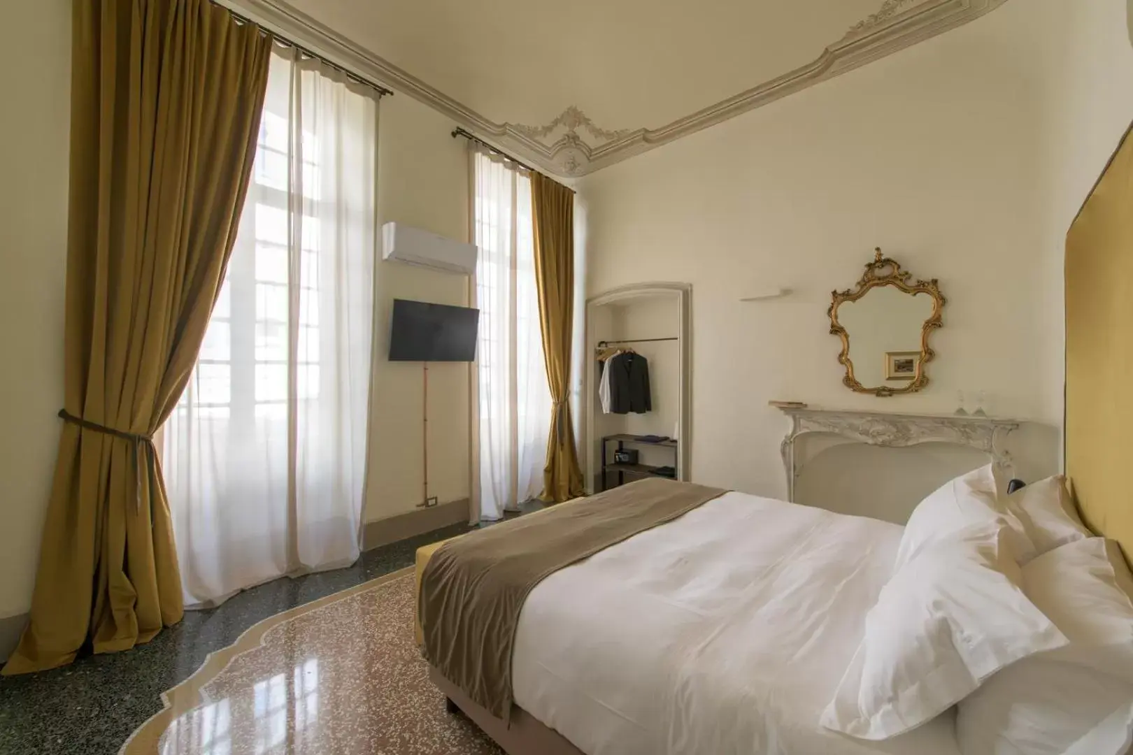 Bed in Palazzo Sertorio Suites