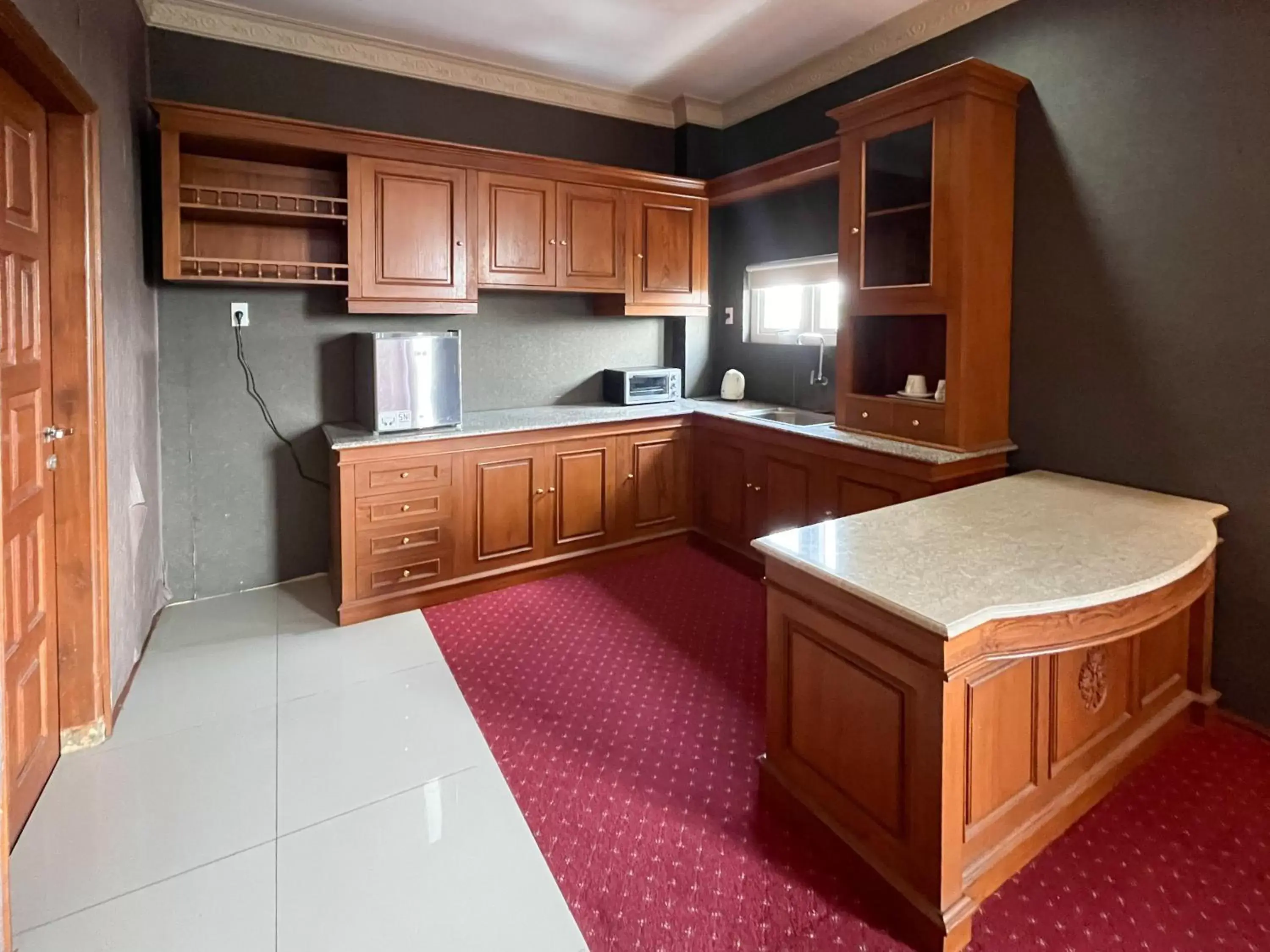 Kitchen or kitchenette, Kitchen/Kitchenette in SUPER OYO Capital O 293 Mutiara Hijau Suites Syariah