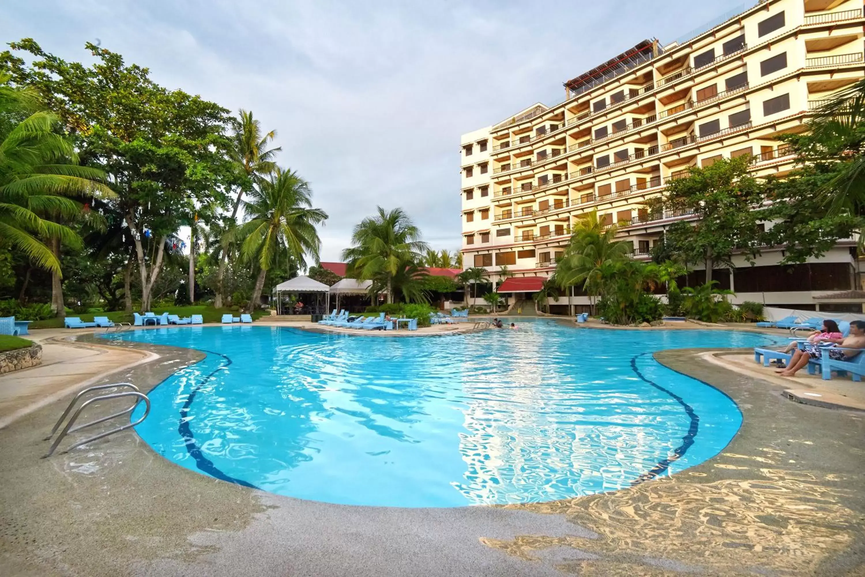 Property building, Swimming Pool in Cebu White Sands Resort and Spa