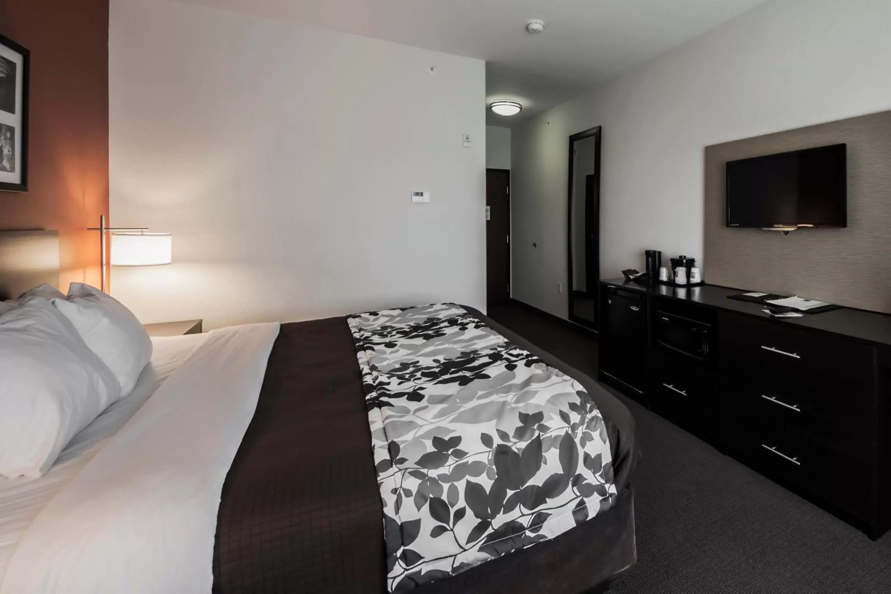 Bed in Sleep Inn & Suites Hennessey North