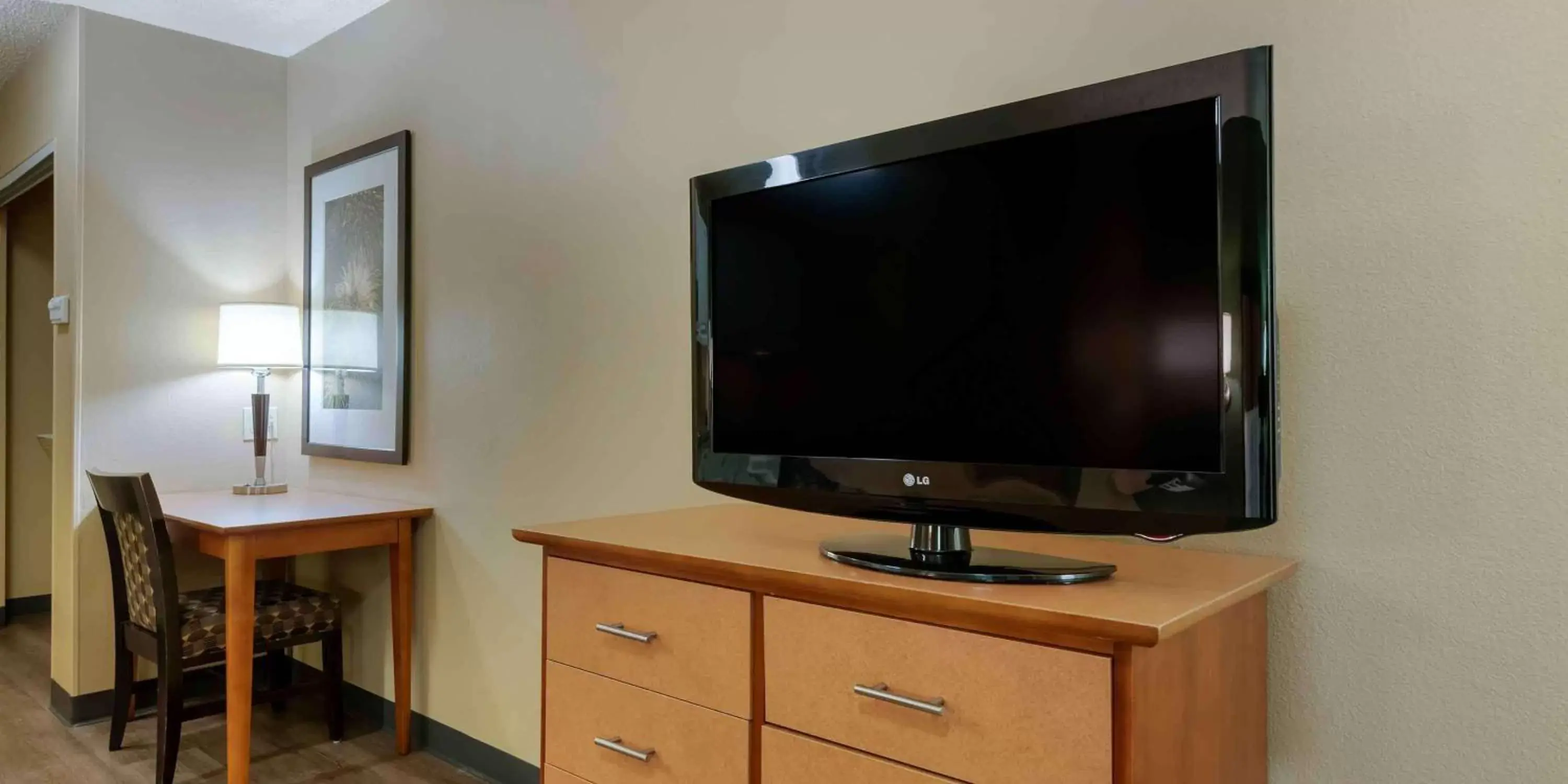 Bedroom, TV/Entertainment Center in Extended Stay America Suites - Orlando - Orlando Theme Parks - Vineland Rd