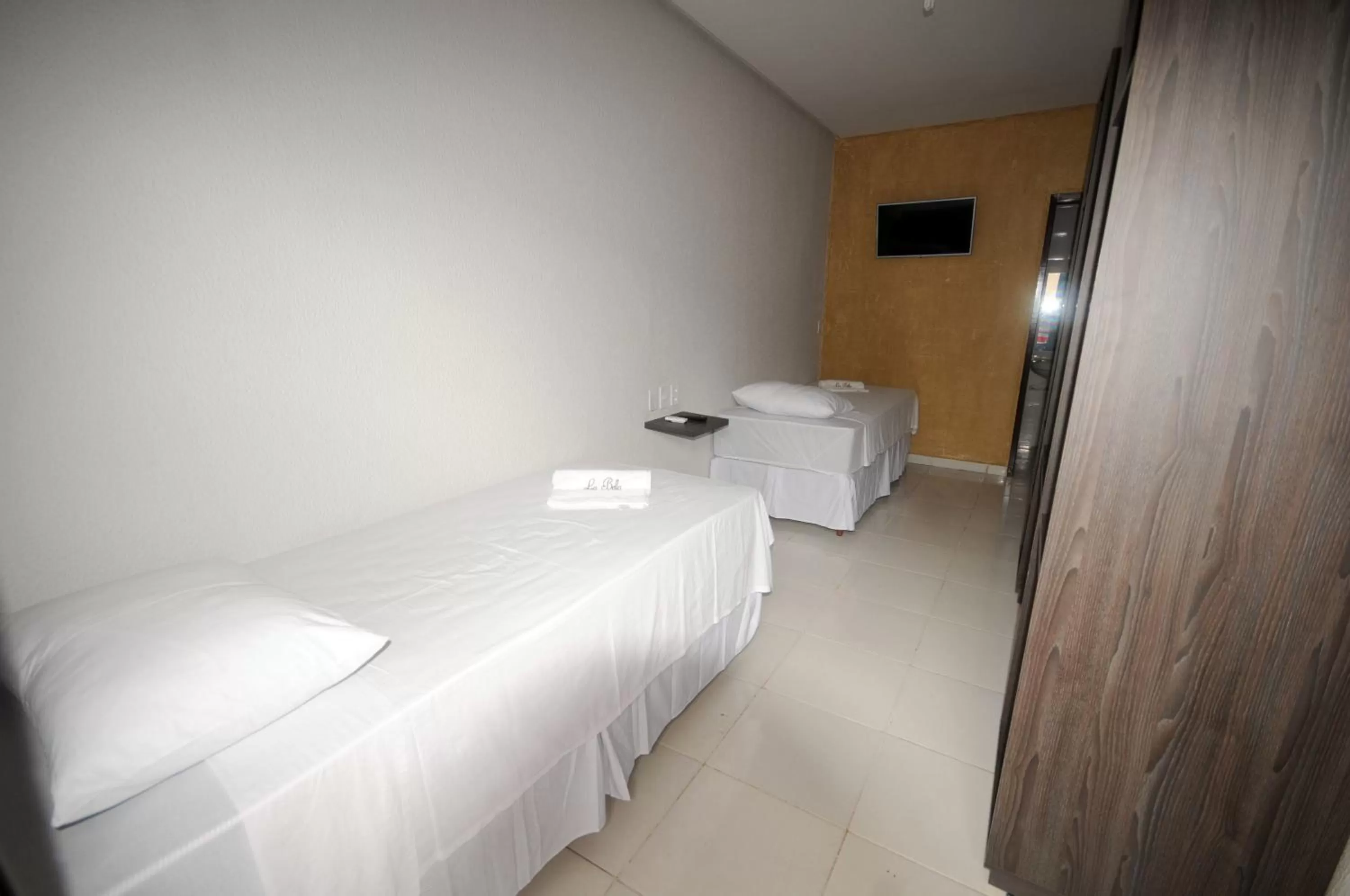 Bed in La Bella Hotel