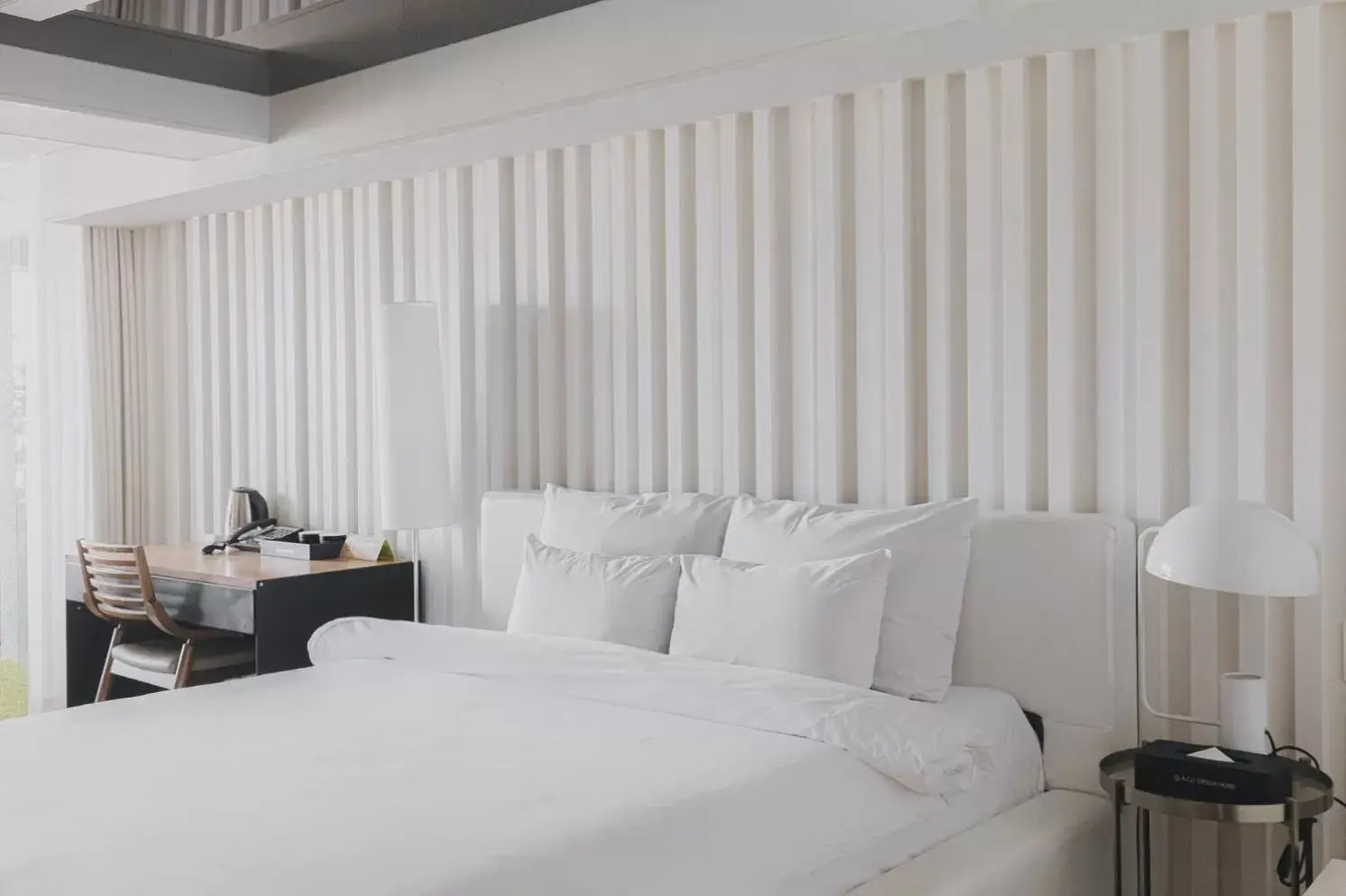 Bed in ACC Design Hotel