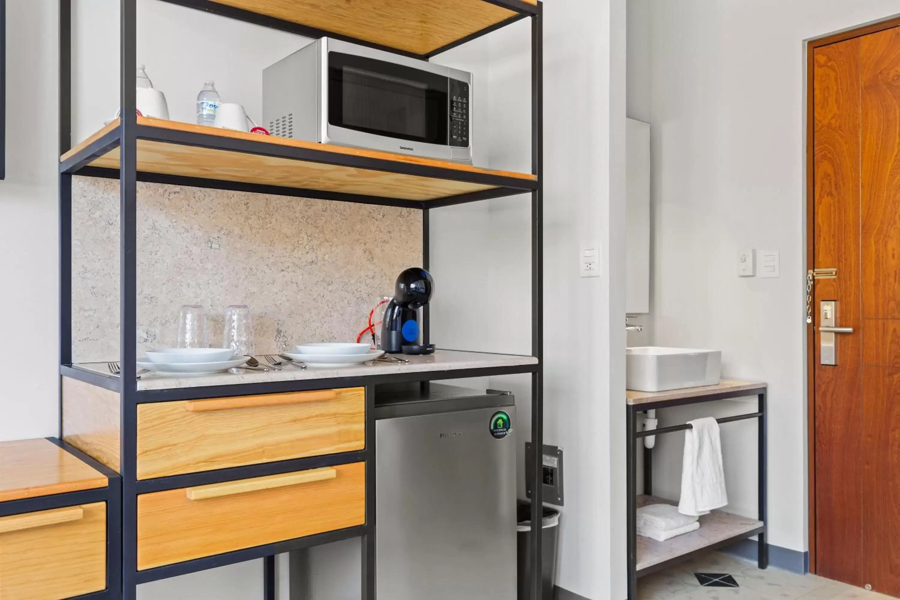 Kitchen or kitchenette in Suites Reforma by HomiRent