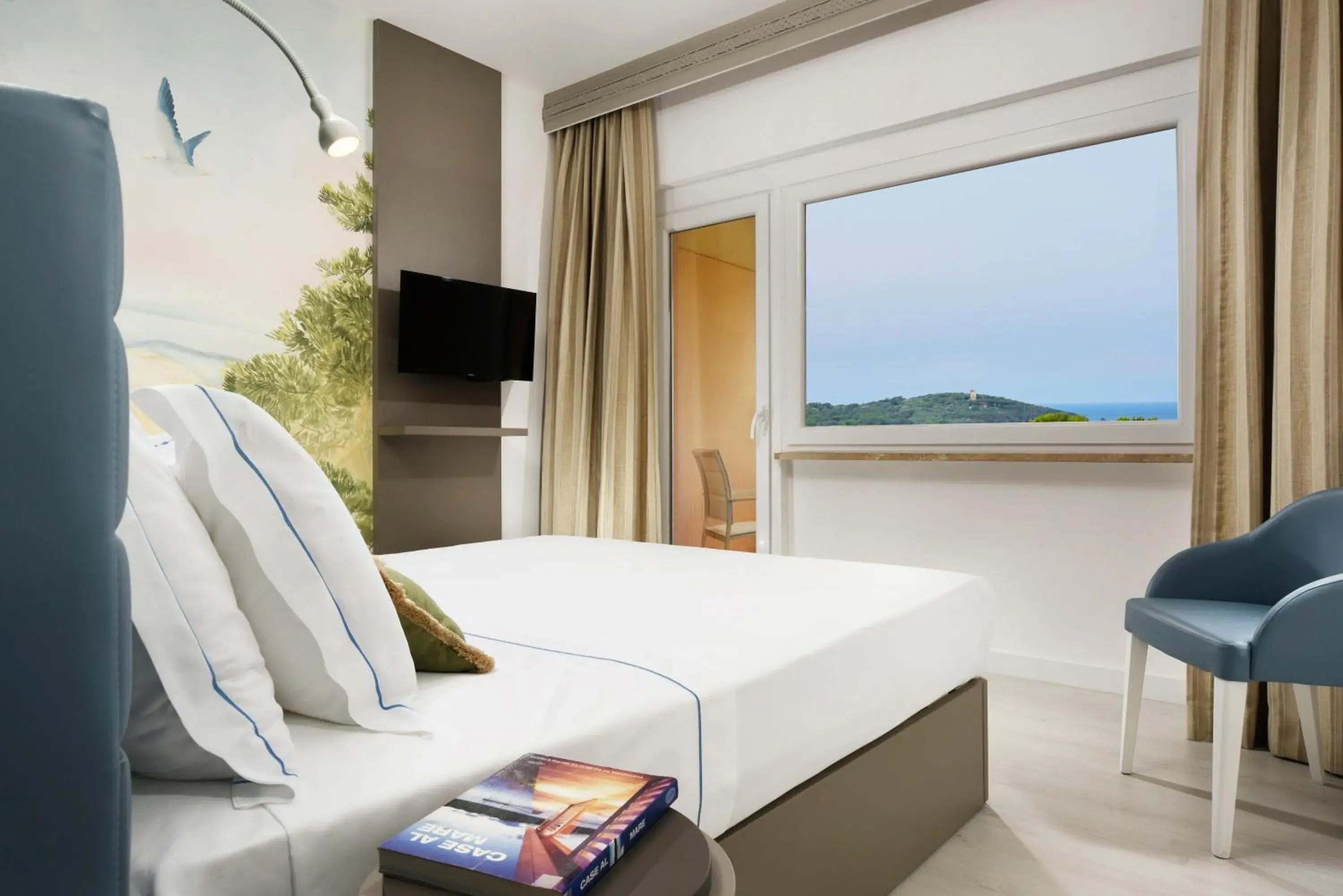 Bed, Mountain View in Golf Hotel Punta Ala