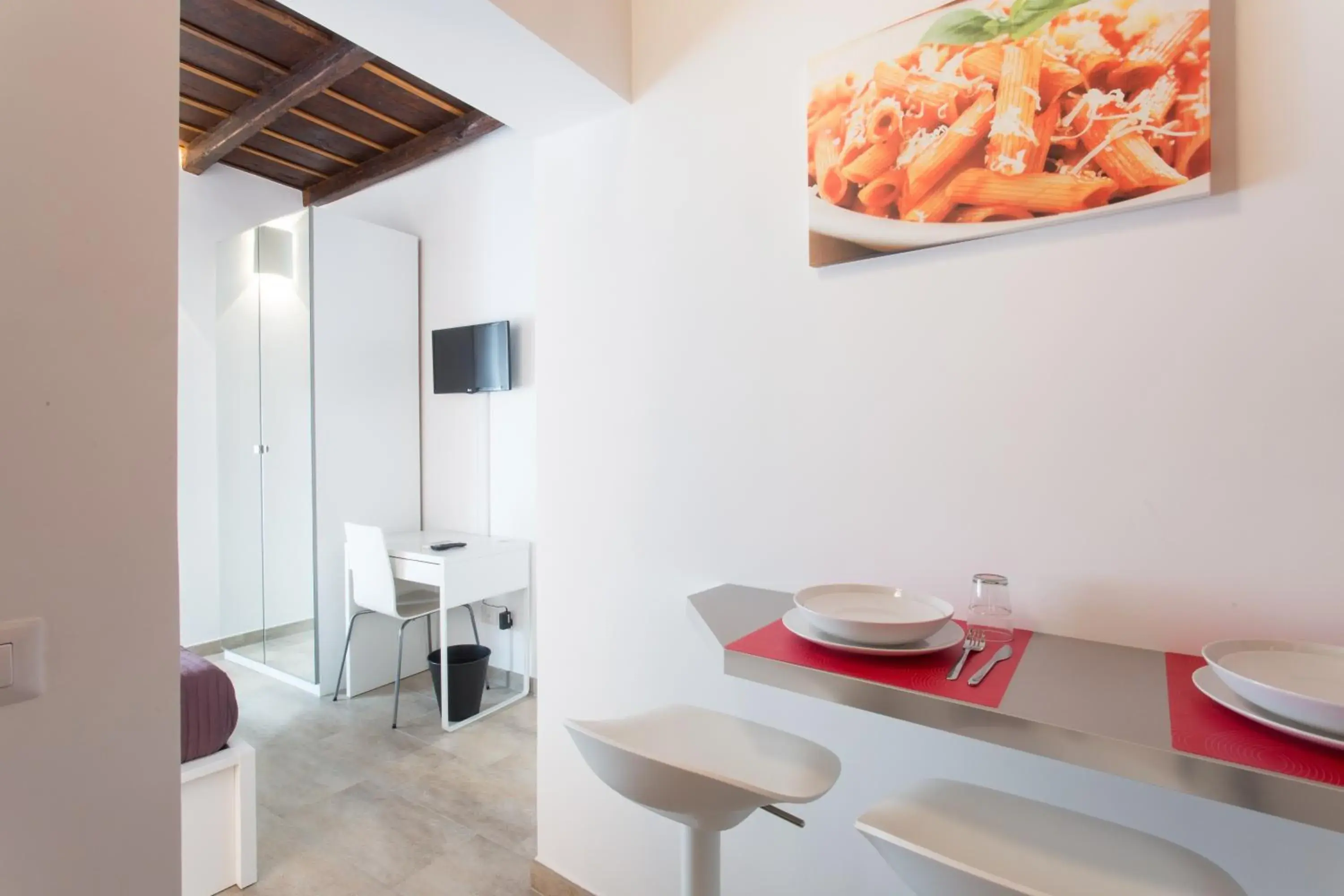 Dining area, TV/Entertainment Center in Domenichino Luxury Home