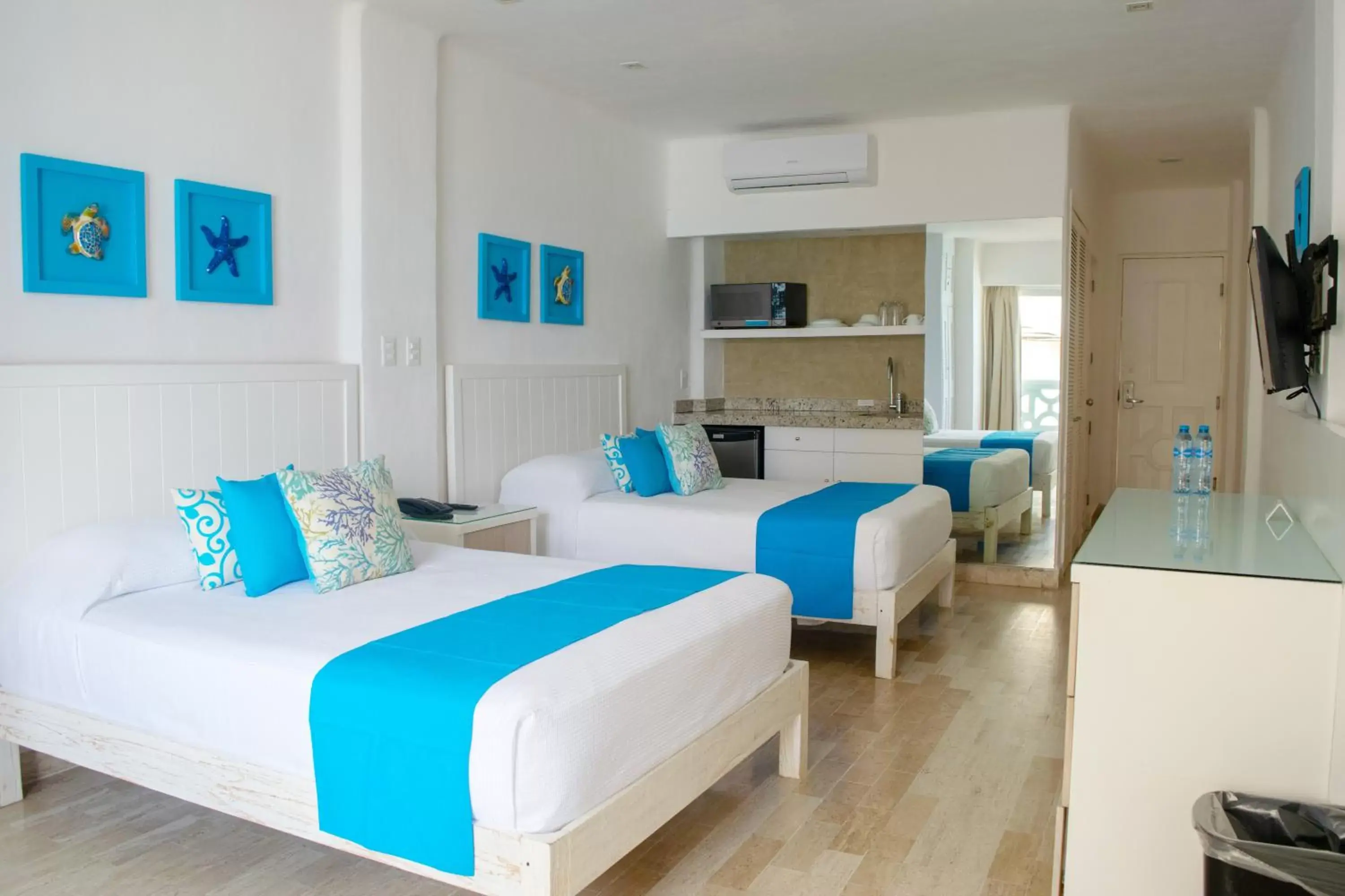 Bed in BSEA Cancun Plaza Hotel