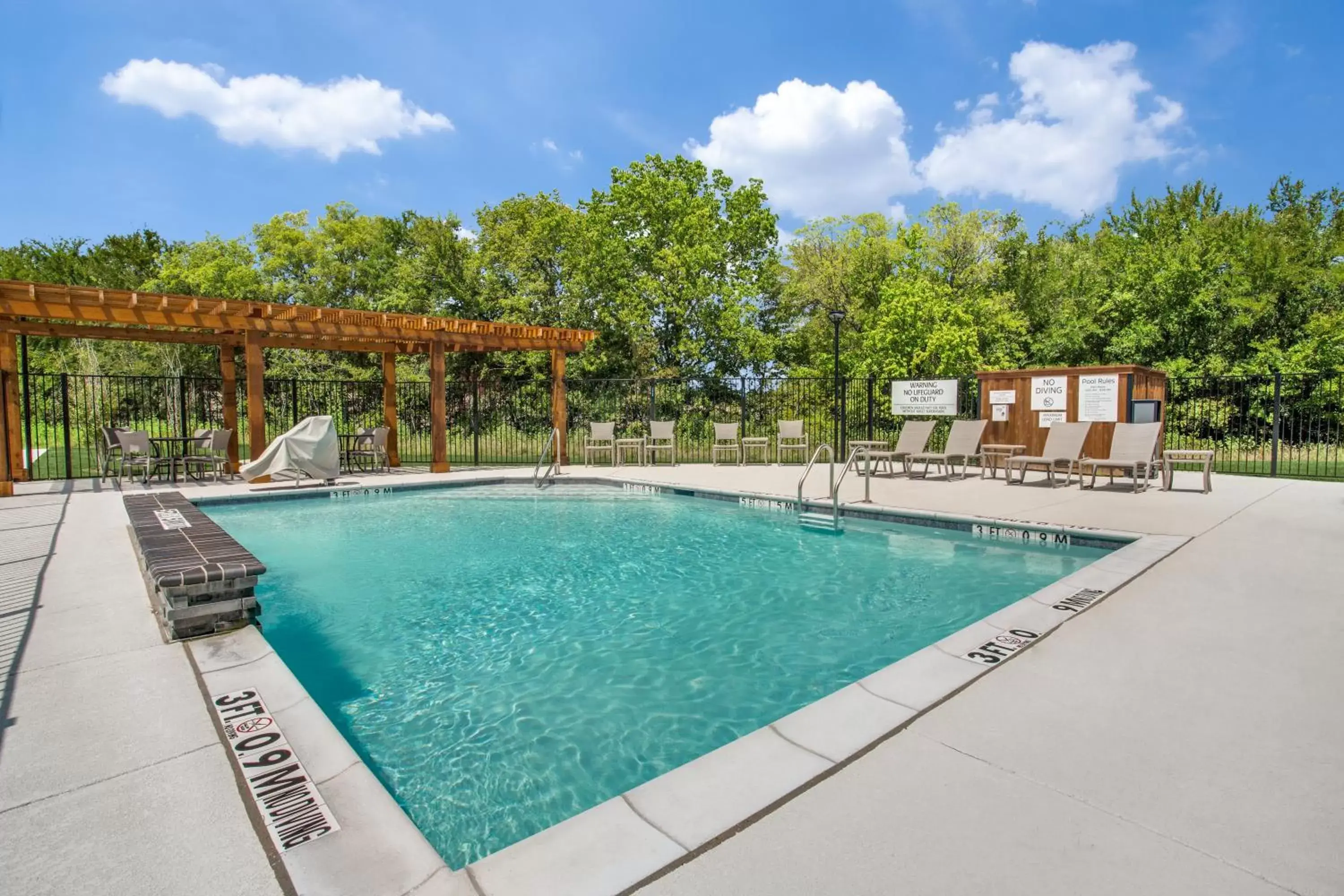 Swimming Pool in Holiday Inn Express & Suites - Denton South, an IHG Hotel