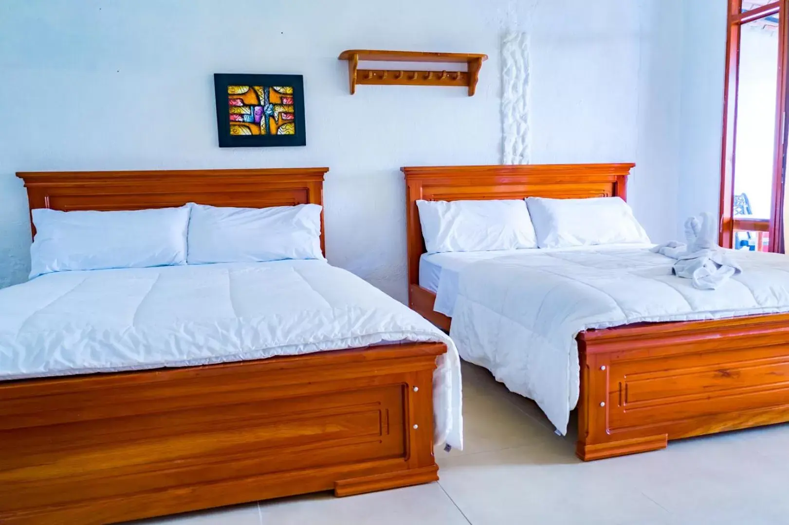 Queen Room with Two Large Beds with Sea View in Royal Galápagos Inn Queen Room with Two Large Beds with Sea View in Royal Galápagos Inn