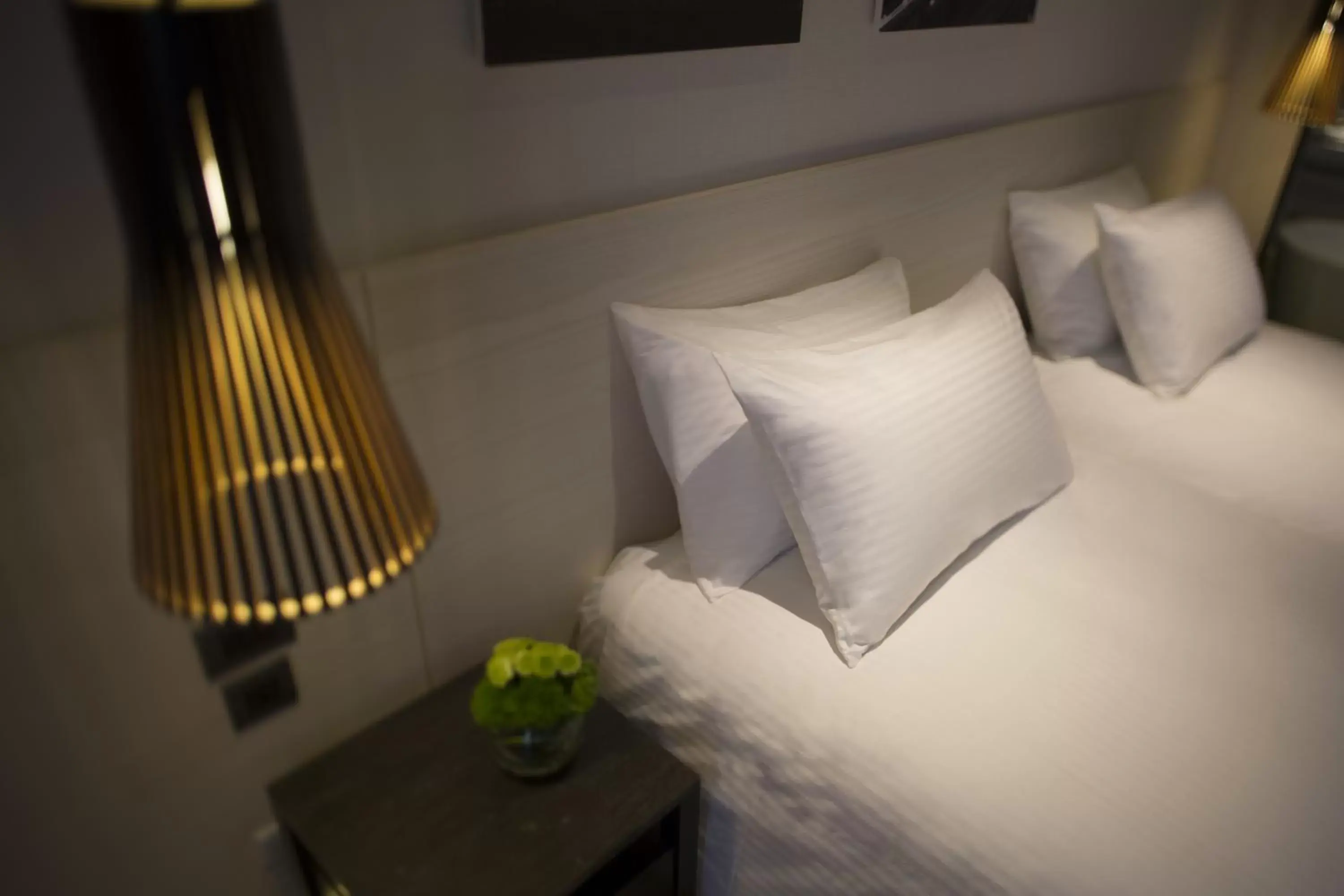 Decorative detail, Bed in Riverview Suites Taipei Decorative detail, Bed in Riverview Suites Taipei