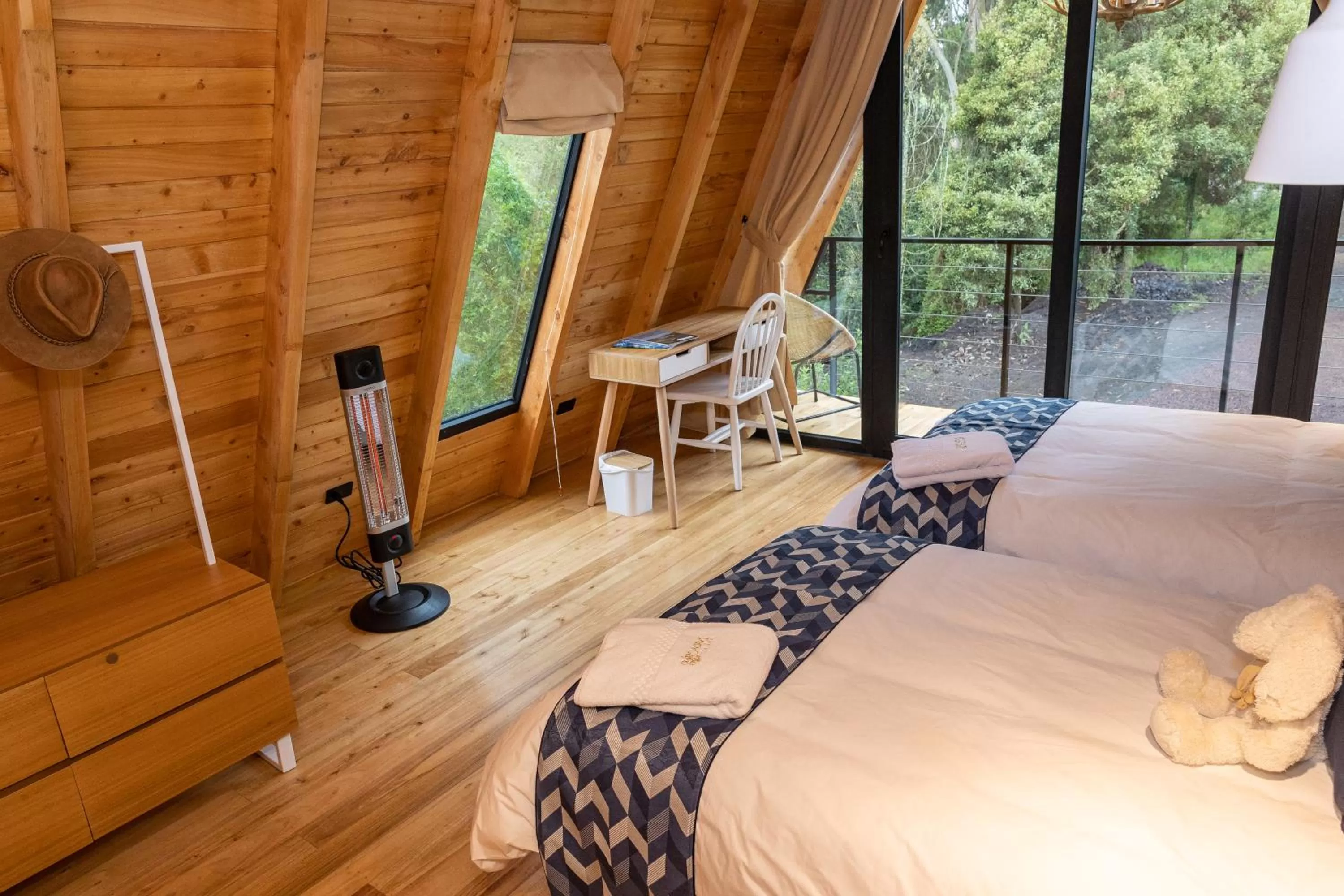 Bed in Hosteria Papagayo Cotopaxi