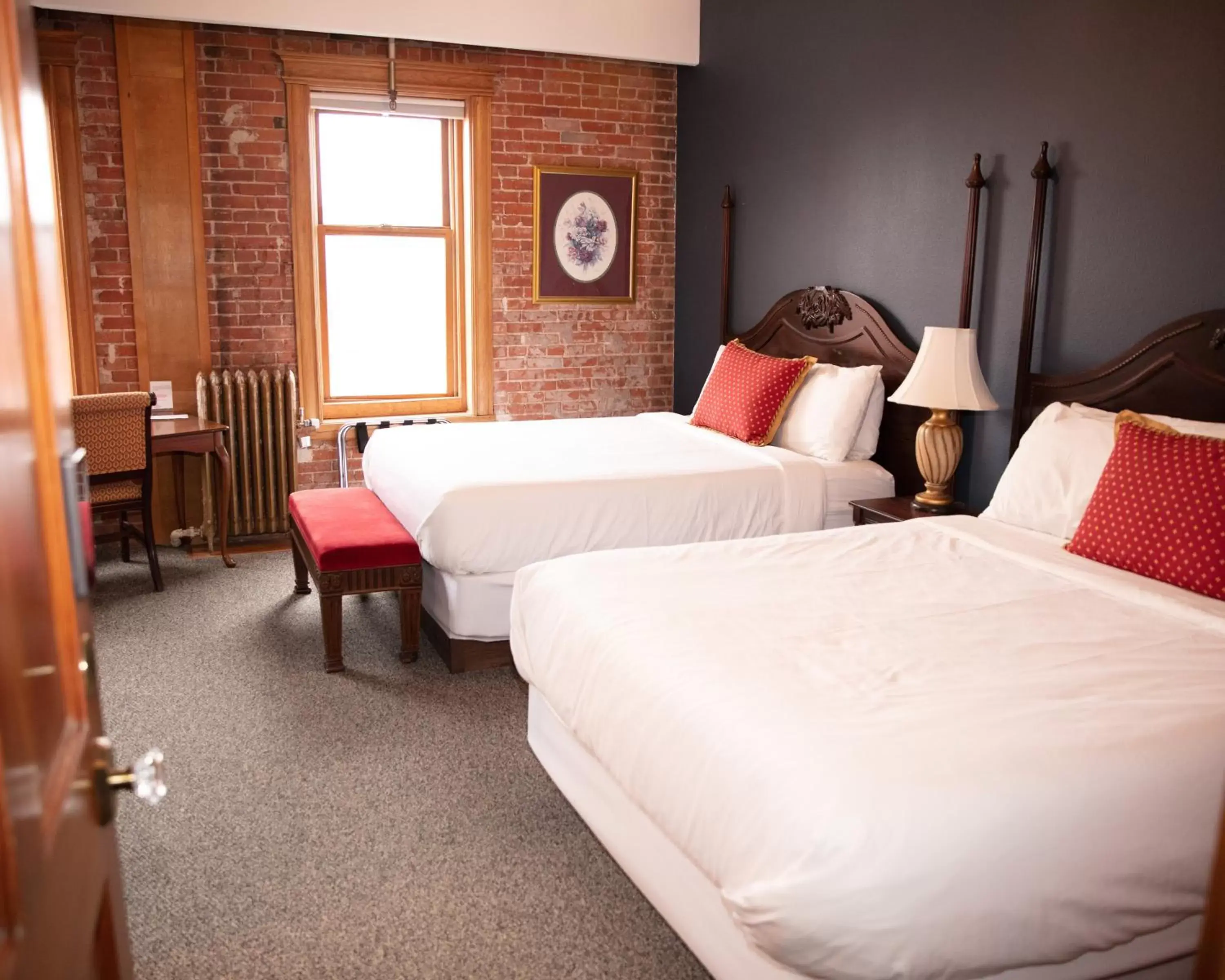 Deluxe Queen Room with Two Queen Beds with Private Bathroom in The Victor Hotel