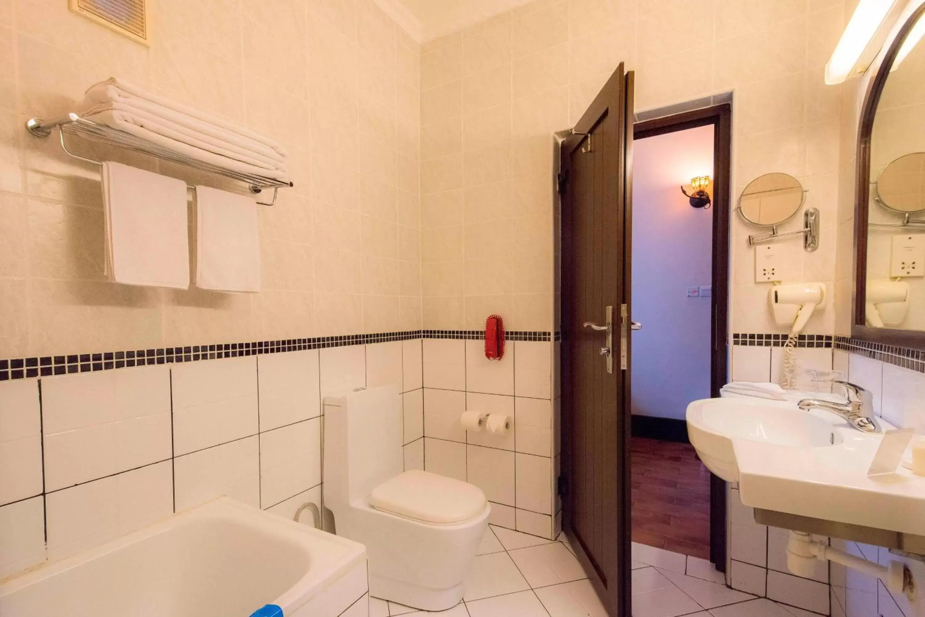 Bathroom in Protea Hotel by Marriott Dar es Salaam Courtyard