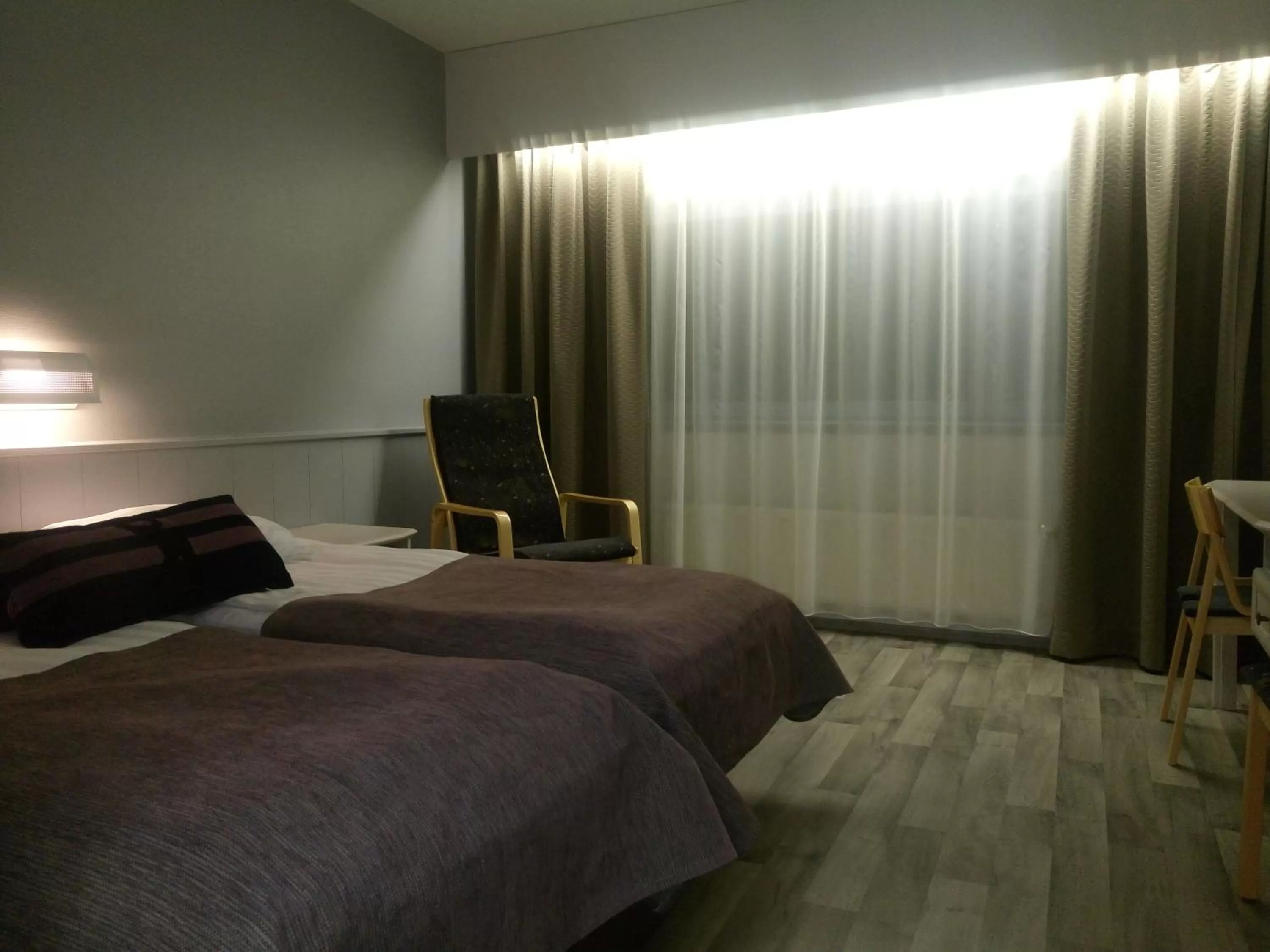 Photo of the whole room, Bed in Hotelli Kivitippu