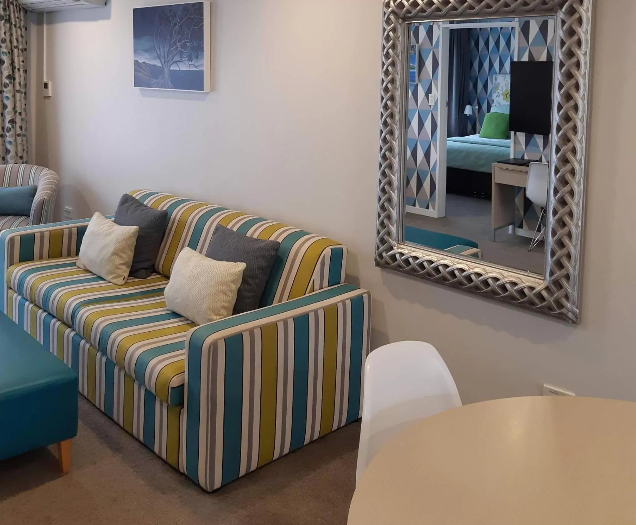 Seating area in ASURE Destiny on Fitzherbert Motel