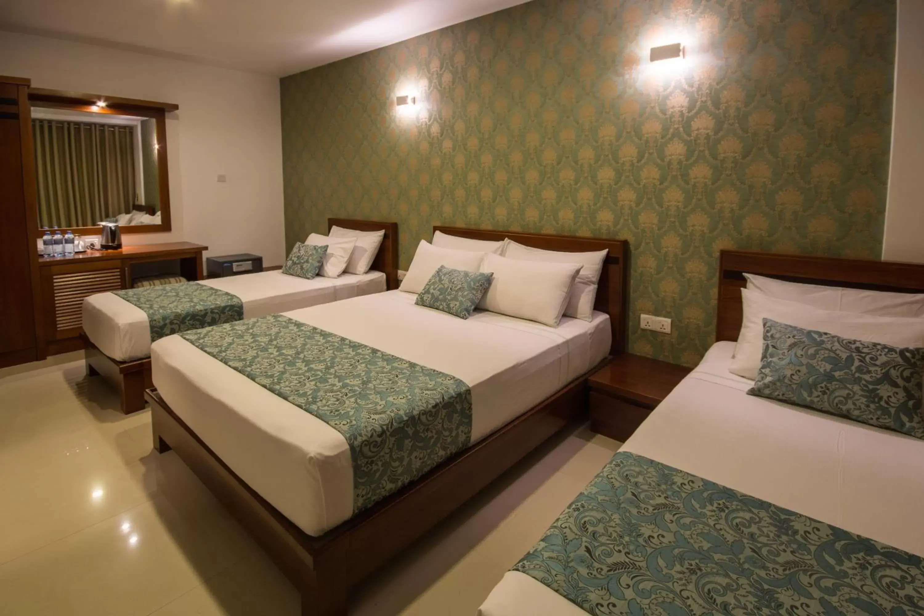 Bed in Ceyloni City Hotel