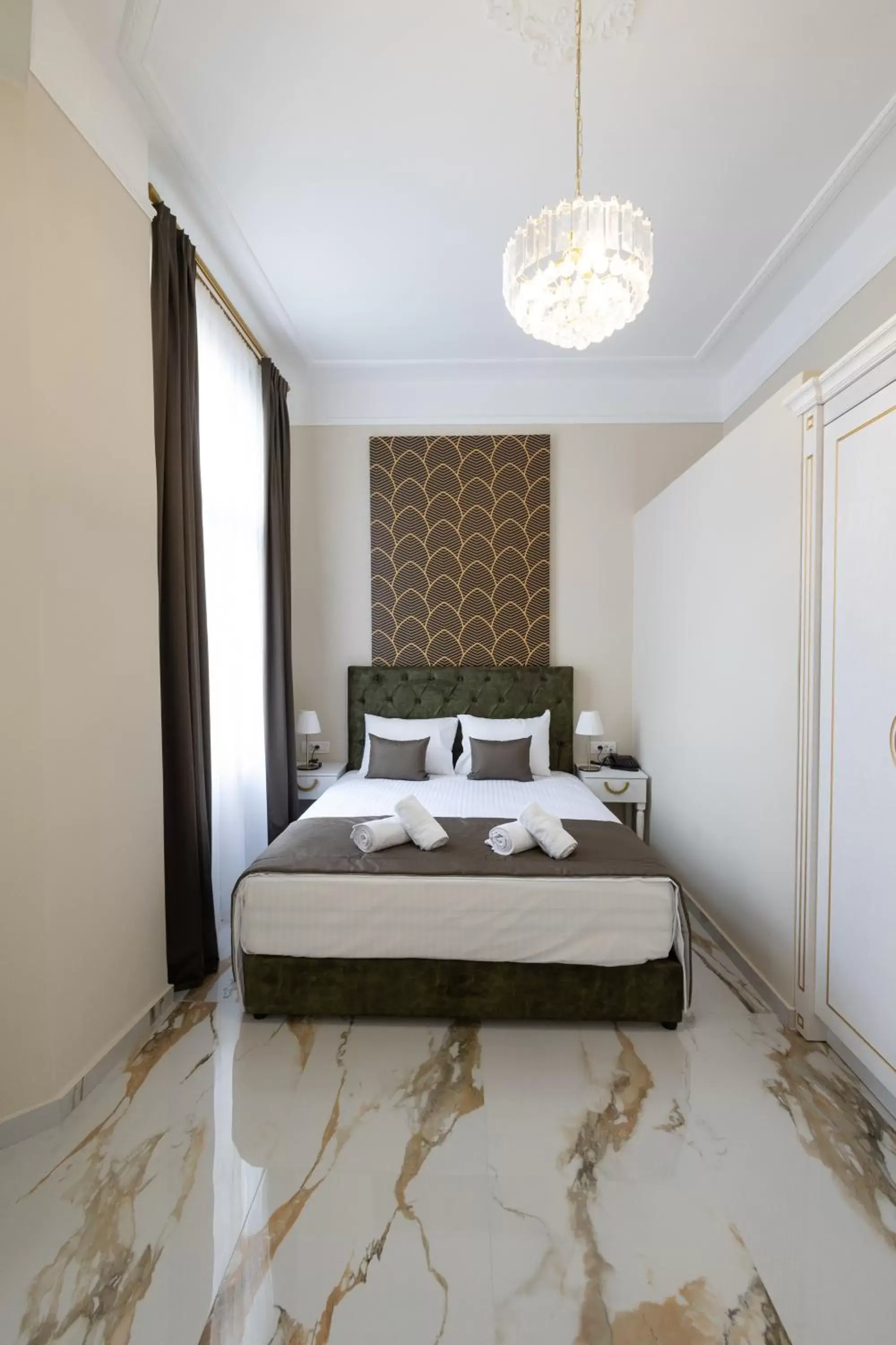 Bed in Modern Revival Luxury Hotel