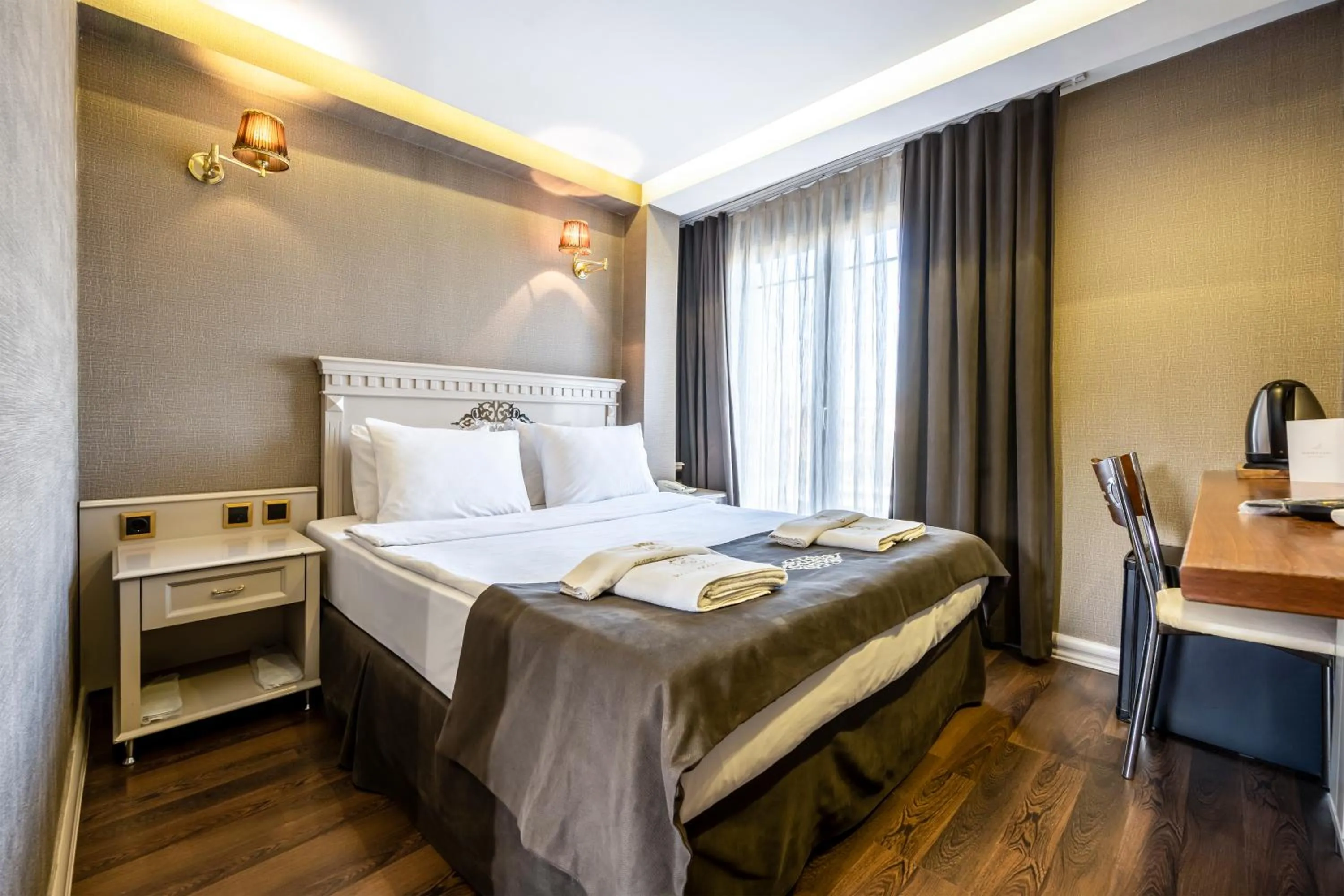 Bed in Golden Gate Hotel Topkapı