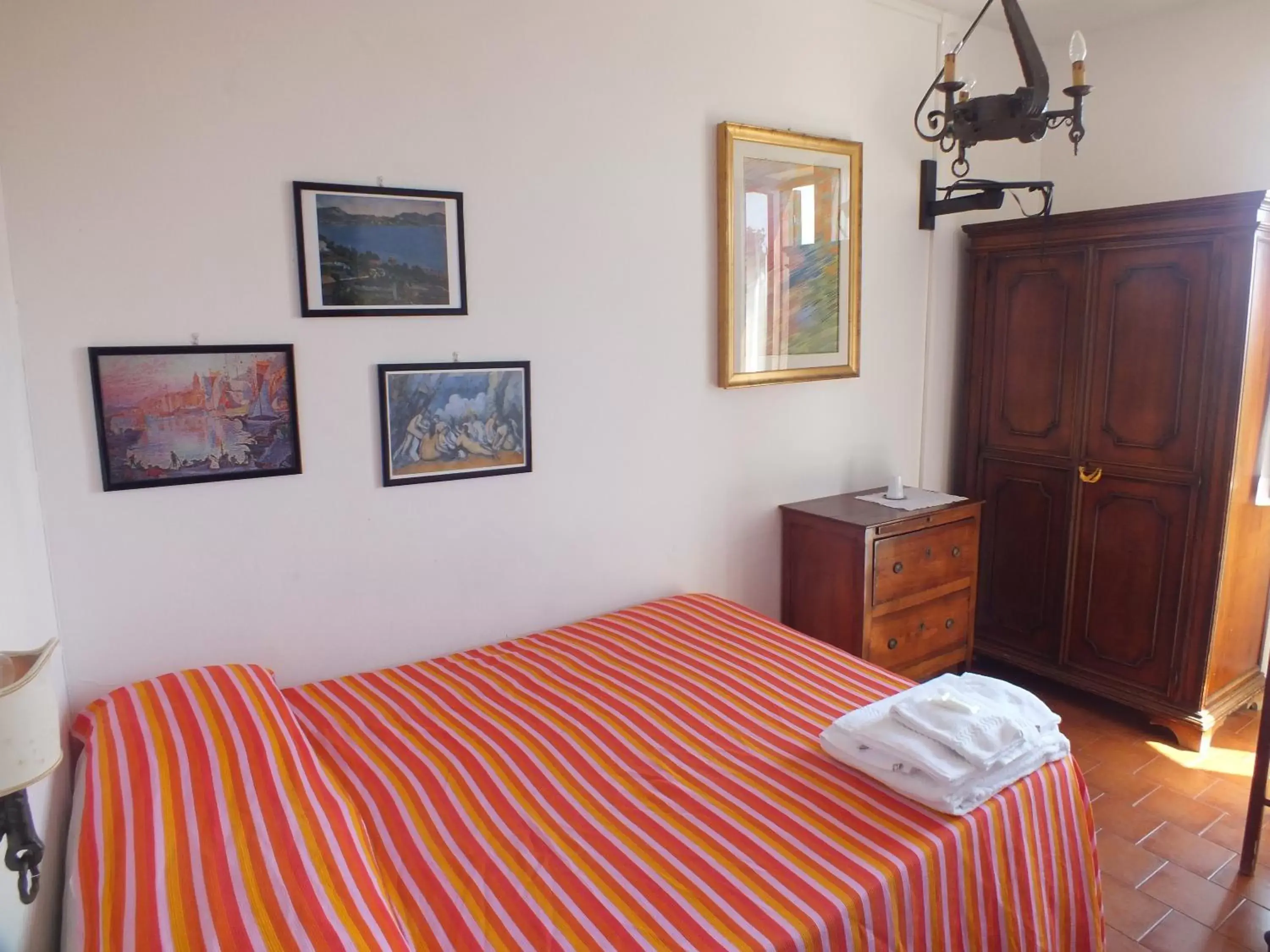 Photo of the whole room, Bed in Locanda Laudomia