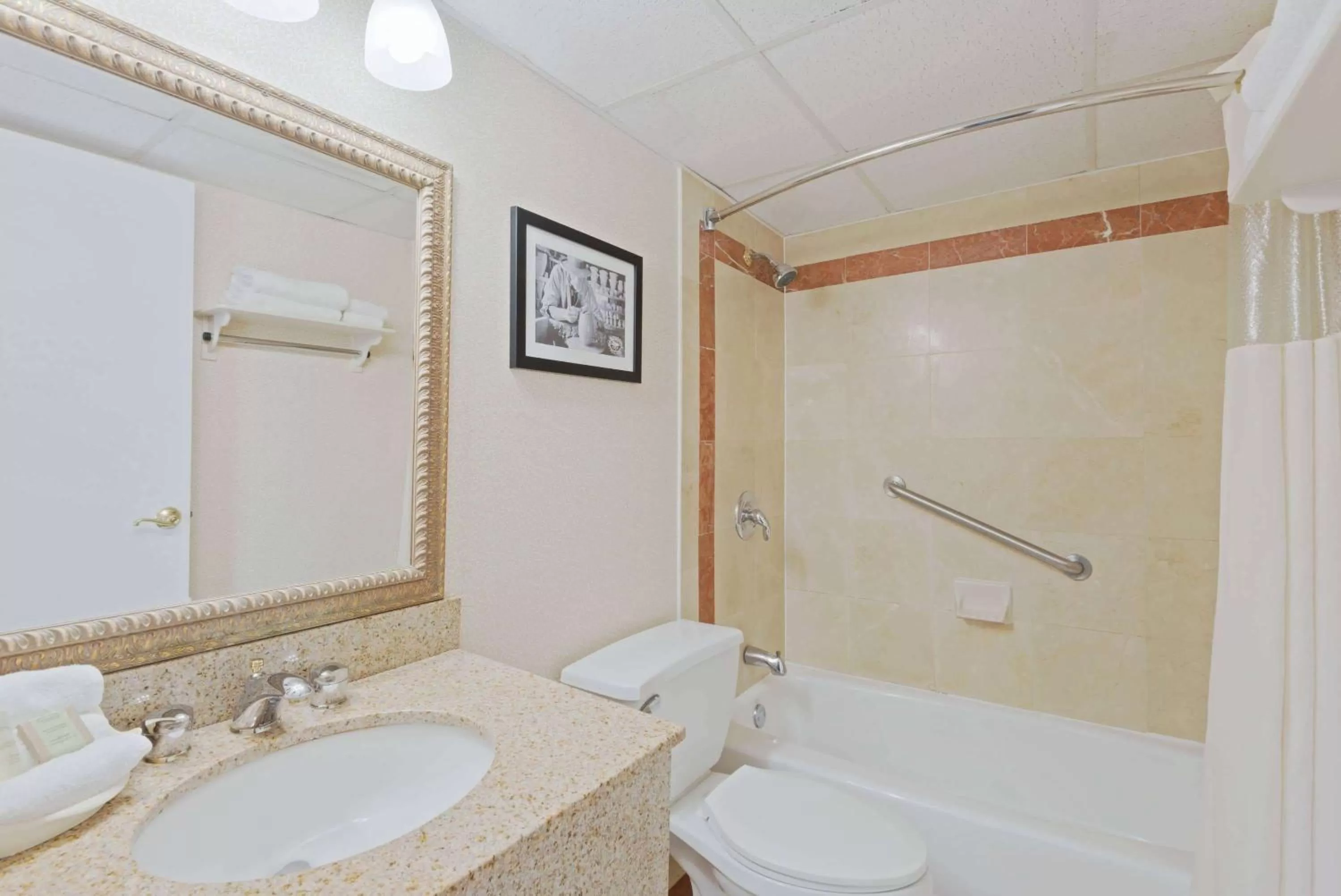 Bathroom in Super 8 by Wyndham Sturbridge