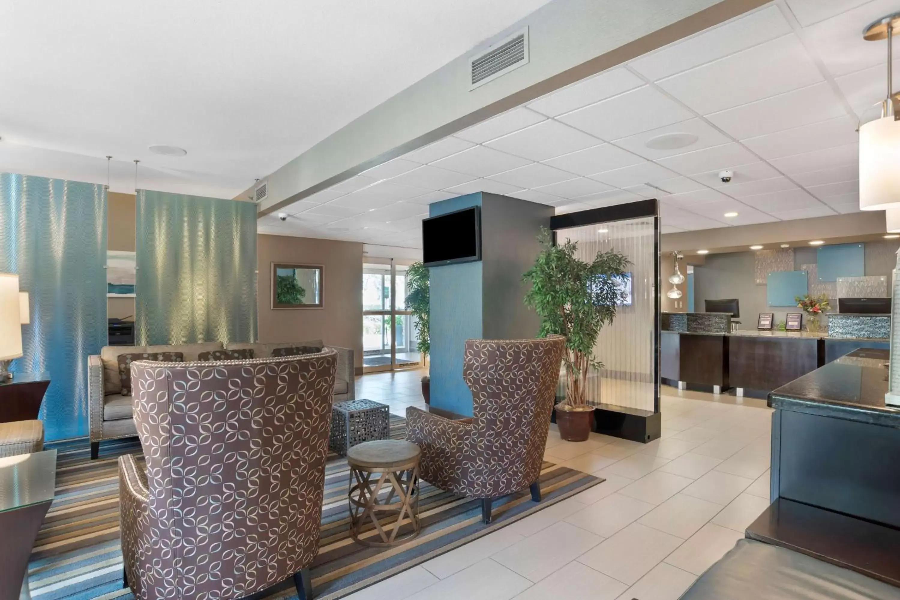 Communal lounge/ TV room, Lobby/Reception in Best Western Plus Tallahassee North Hotel