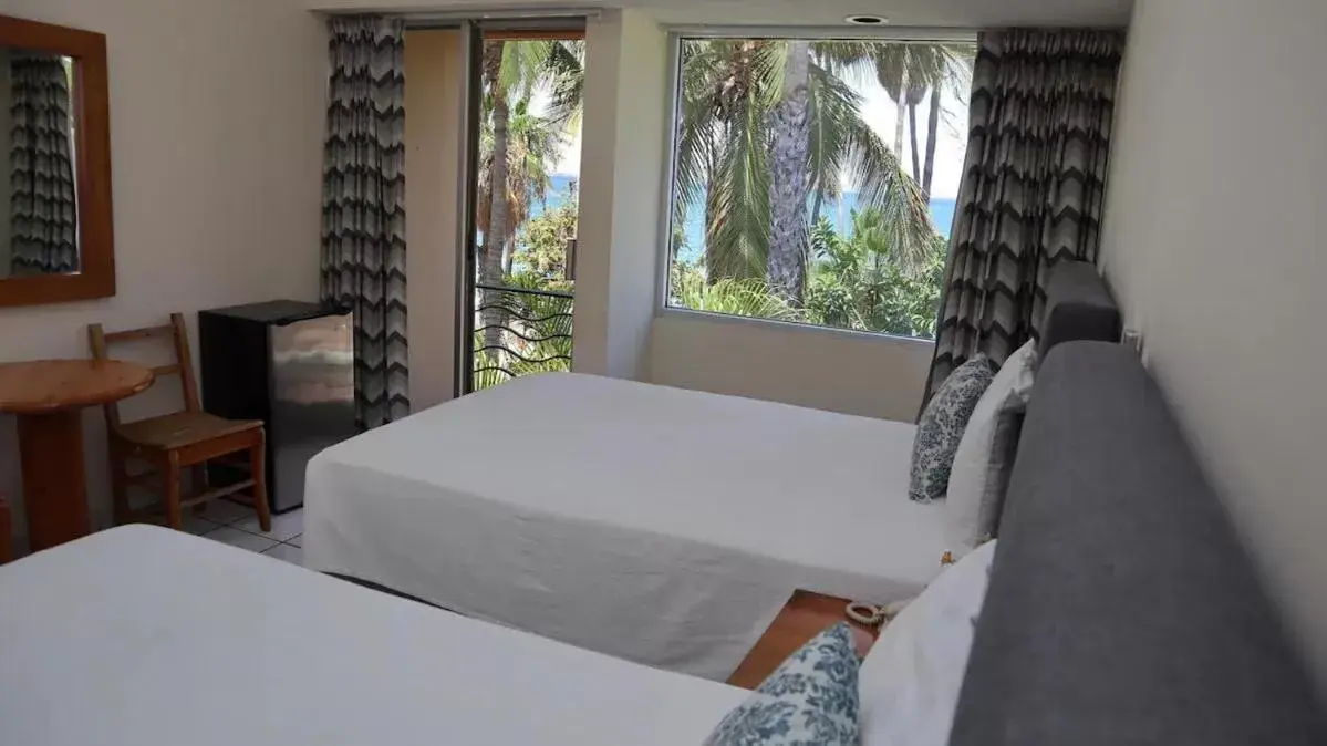 Bed in La Concha Beach Hotel & Club