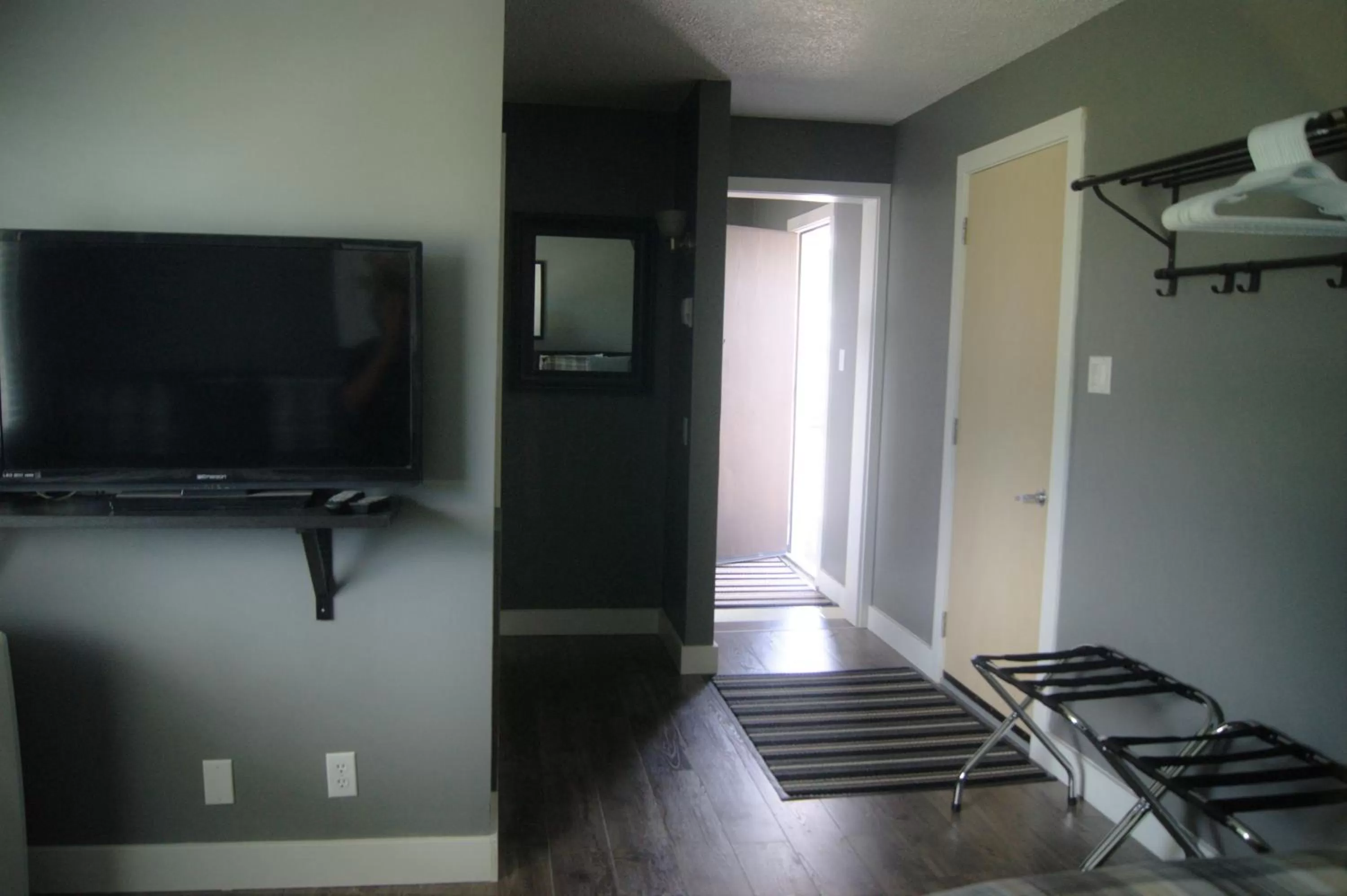 Bedroom, Seating Area in Stardust Inn and Chalets