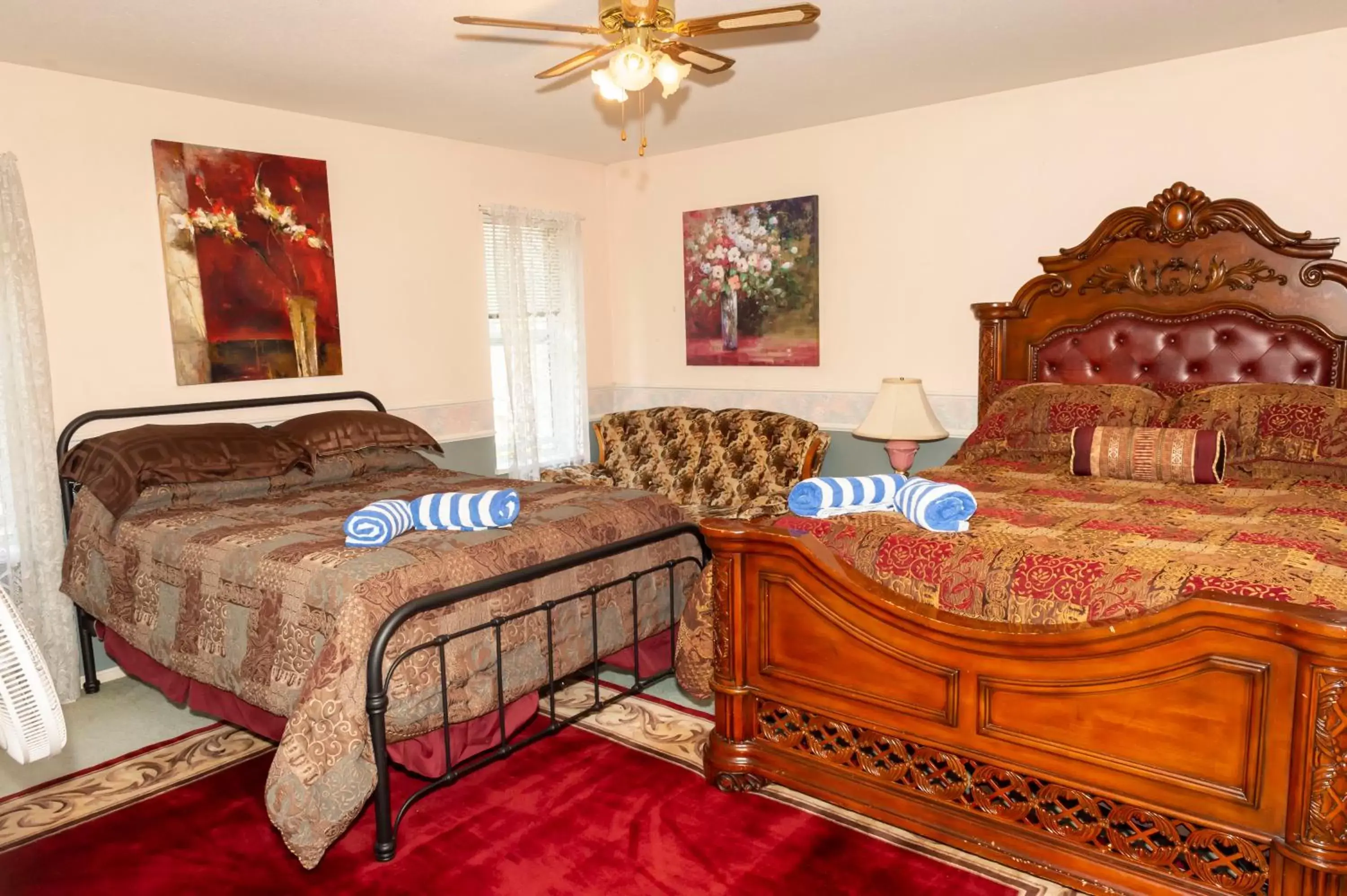 Bed in Anita's Bed & Breakfast Master Bedroom with 2 Queen Beds - 4 People